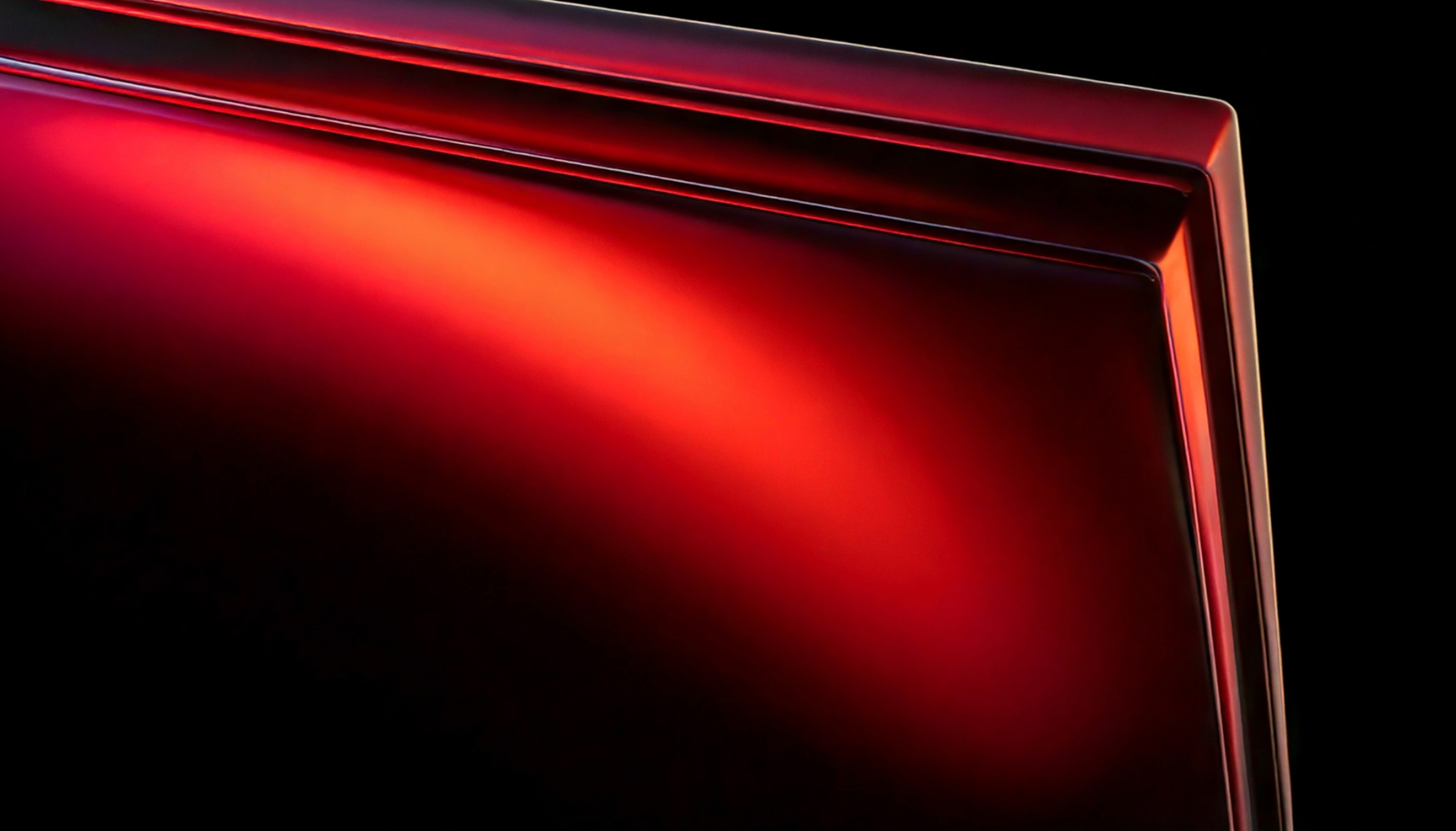 Abstract flowing waves in grayscale creating a smooth, undulating pattern with light and shadow gradients