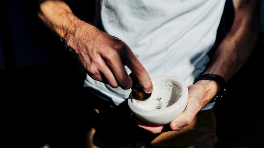 Hands working with a mortar and pestle