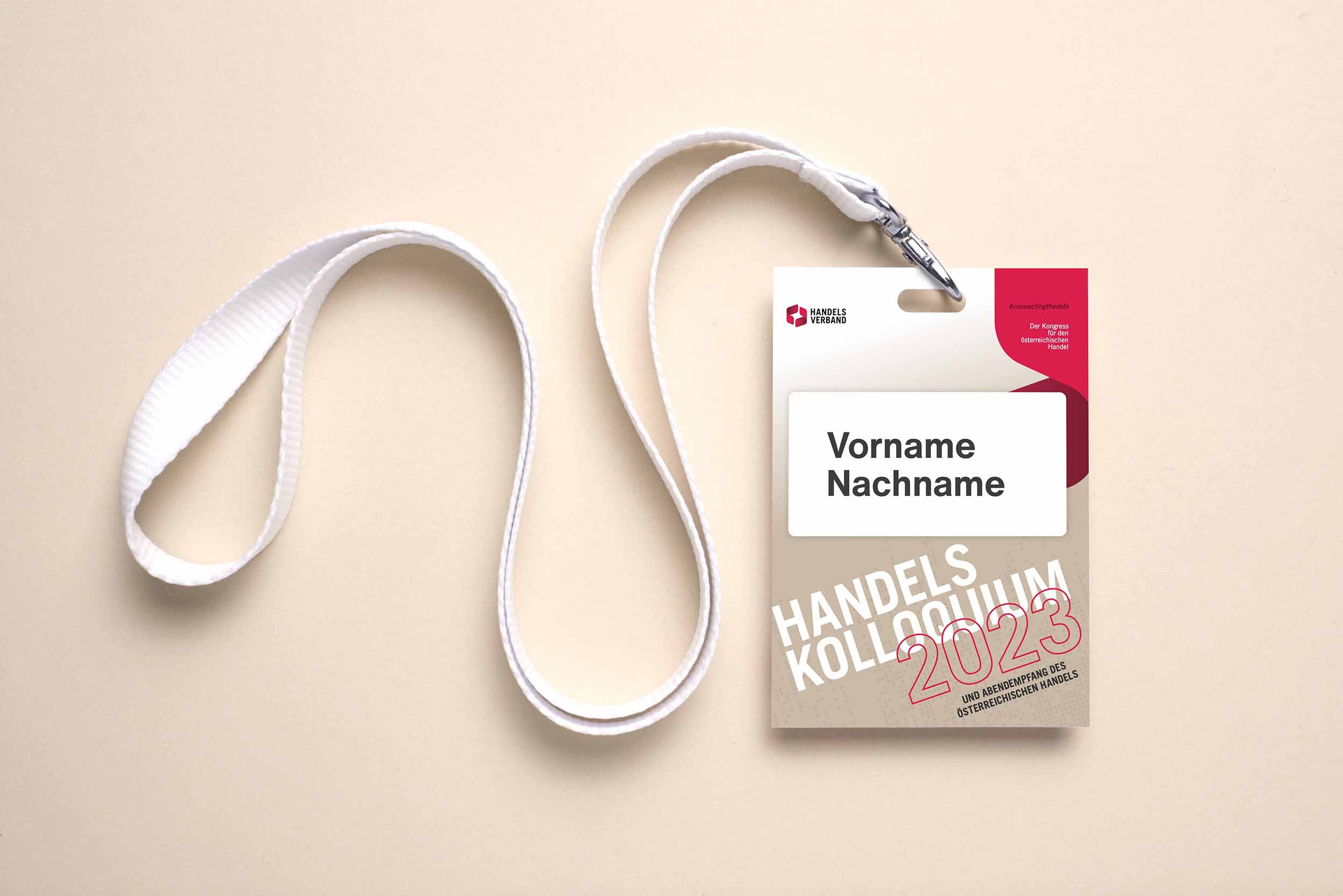 Namenskarte und Lanyard für den Eventtag. Gestaltung eines funktionalen und markenkonformen Akkreditierungssystems für Veranstaltungen des Handelsverbands