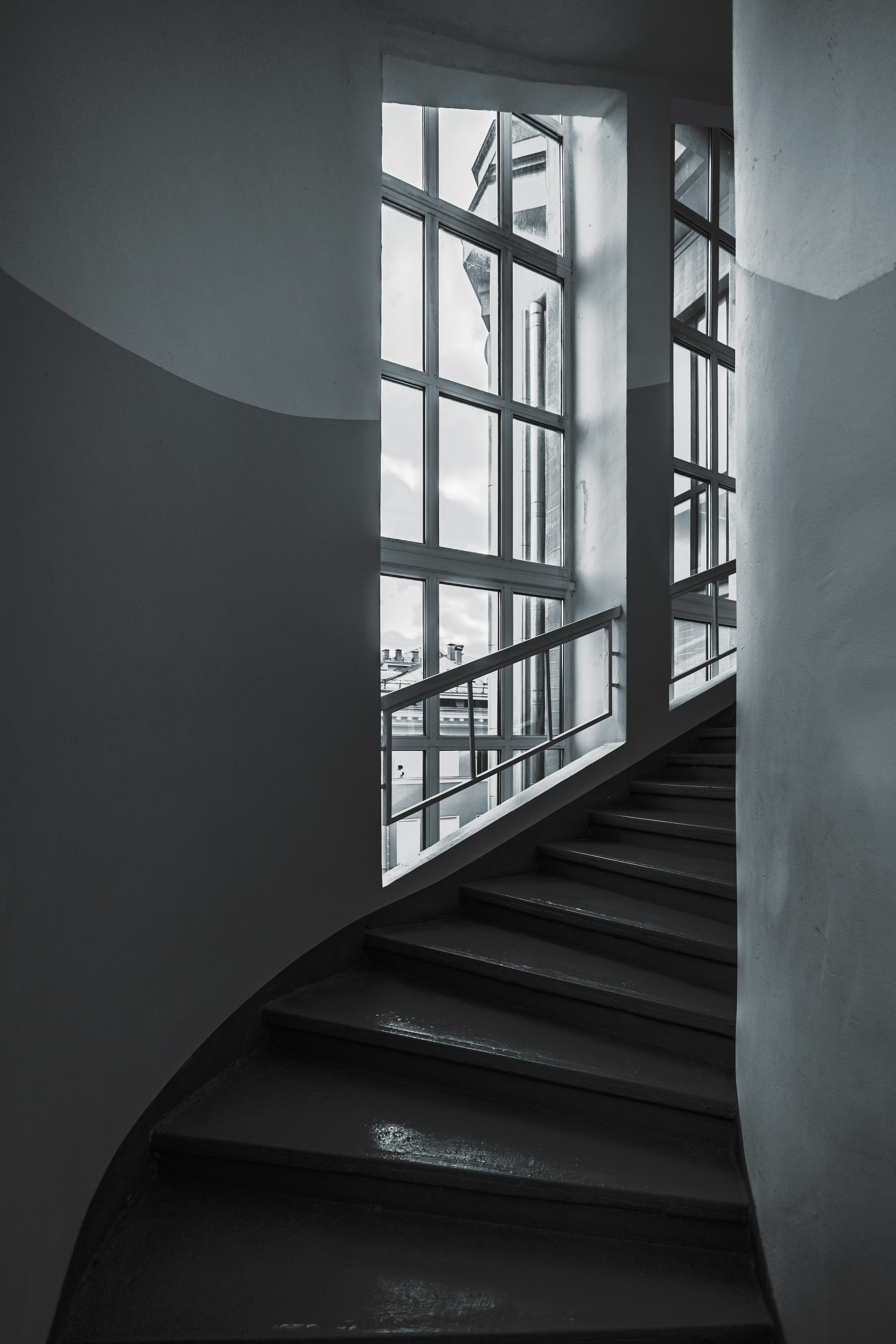 a black and white photo of a staircase