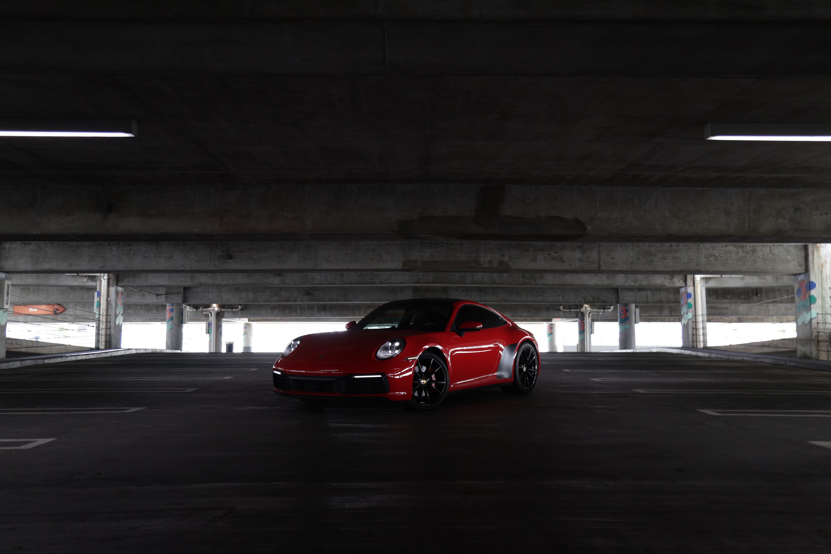 Premium Porsche 911 Carrera S with its driver-focused cockpit and customizable digital display – perfect for luxury car rental Miami experiences.