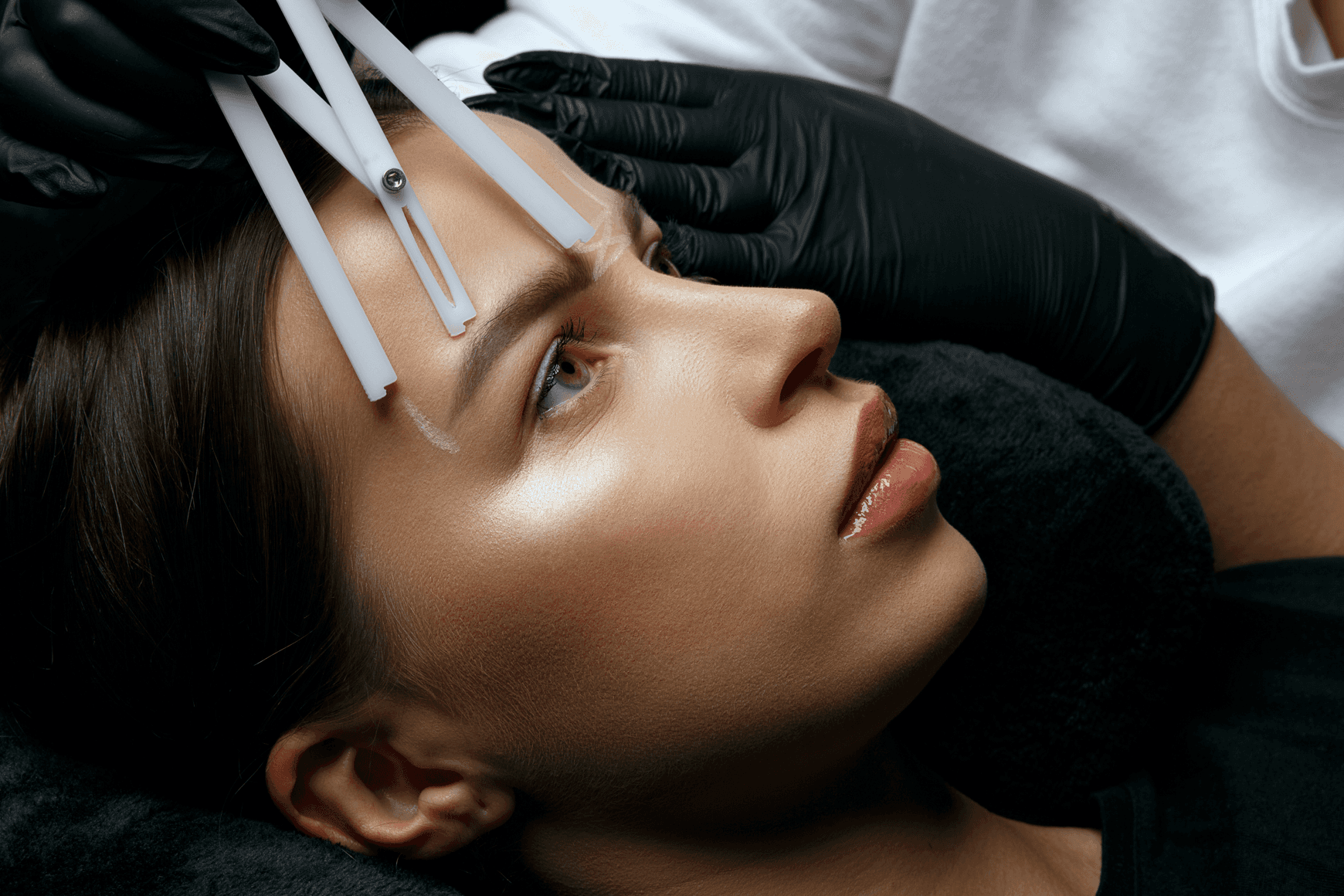 Woman receiving cosmetic skin treatment