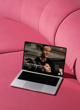 woman sitting around table holding tablet