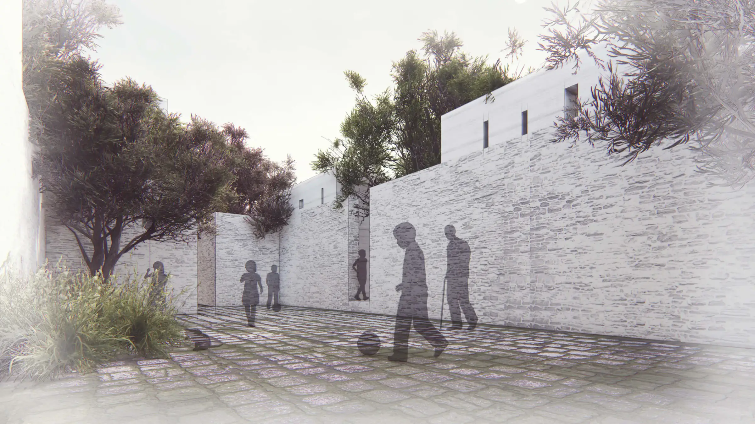 Street between white stone walls with people