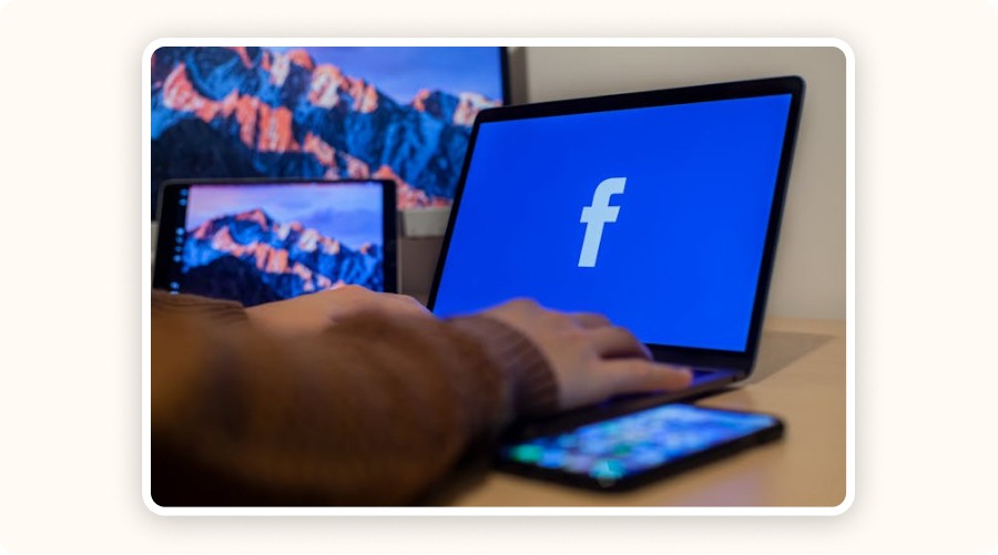 Screen with Facebook logo