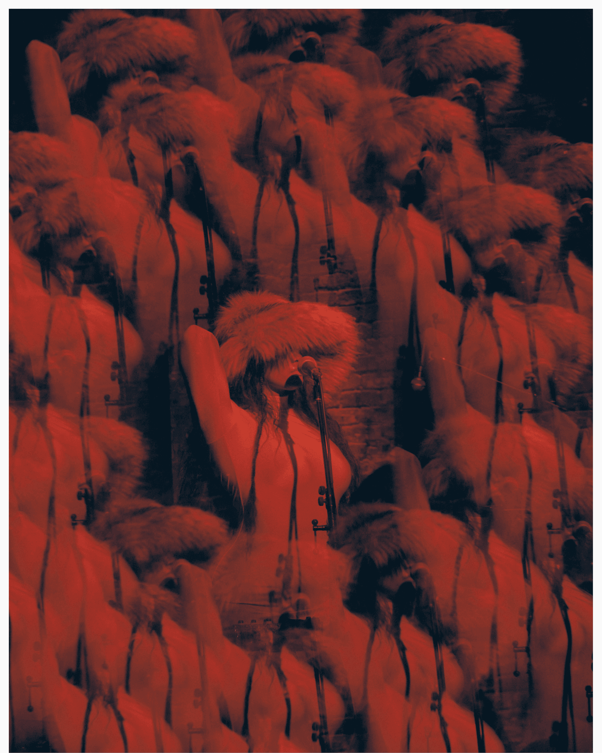 American flag flying against a cloudy sky