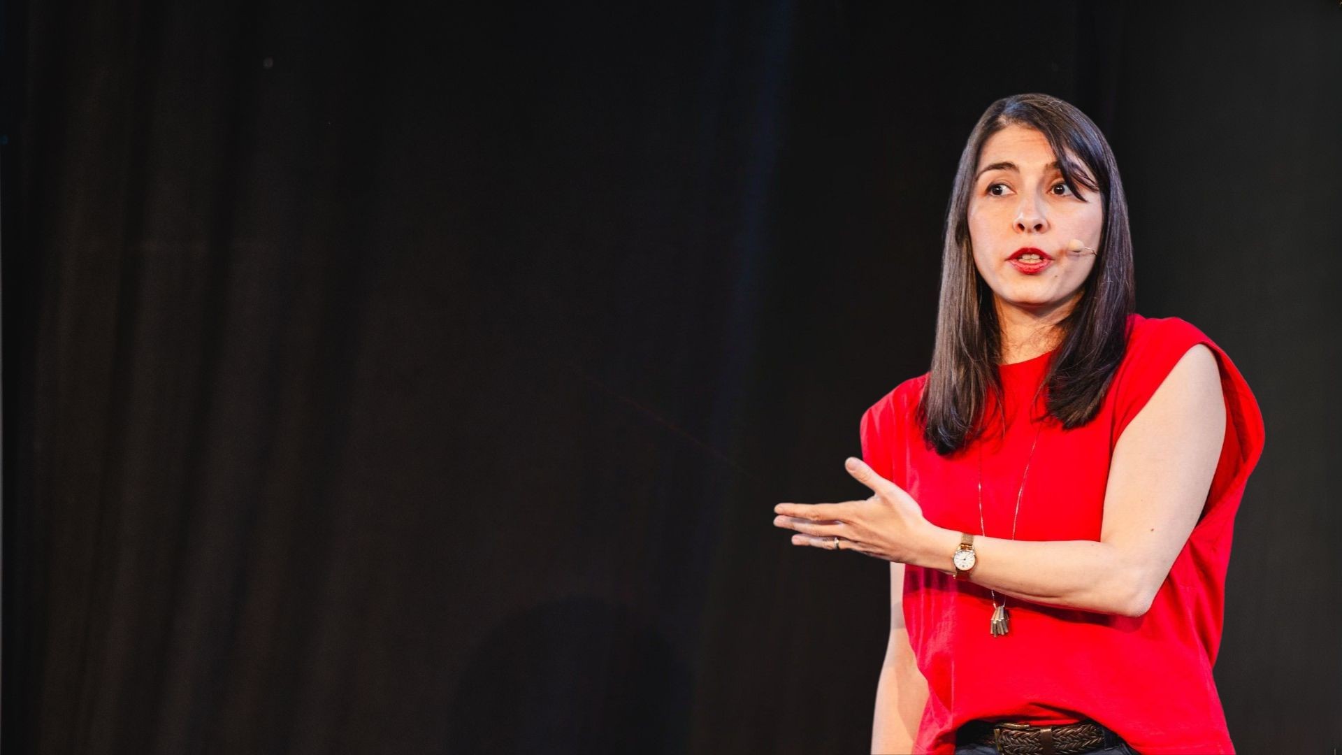 Busra on stage pointing