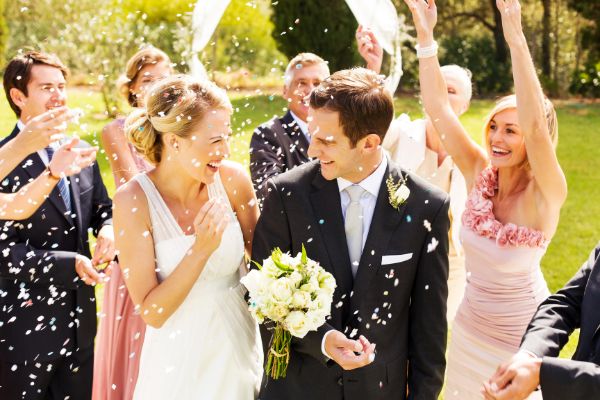 An elegant outdoor wedding ceremony in Barrie, Ontario, featuring a scenic backdrop of lush greenery and a professional setup by NightStyle DJs, adding a touch of sophistication to the event.