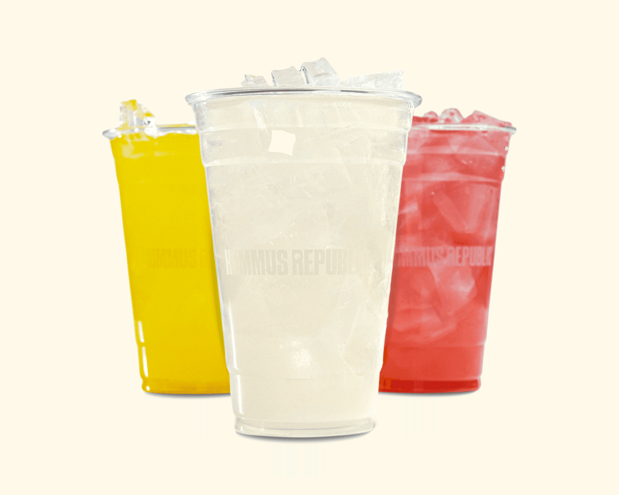 front facing shot of 3 plastic cups of lemonade. 