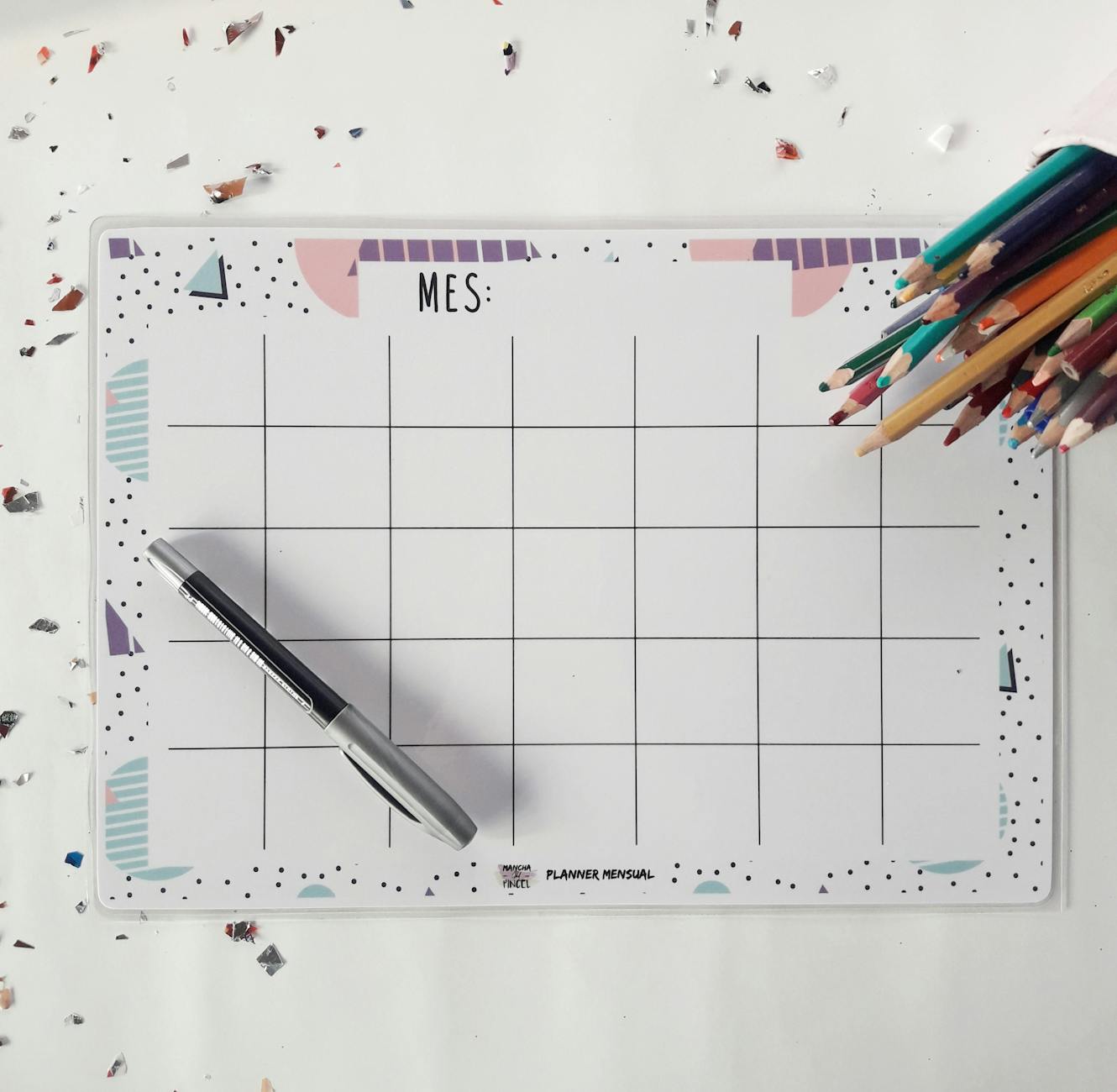 High-angle view of organized student notebooks and gold star stickers used for classroom behavior management strategies.