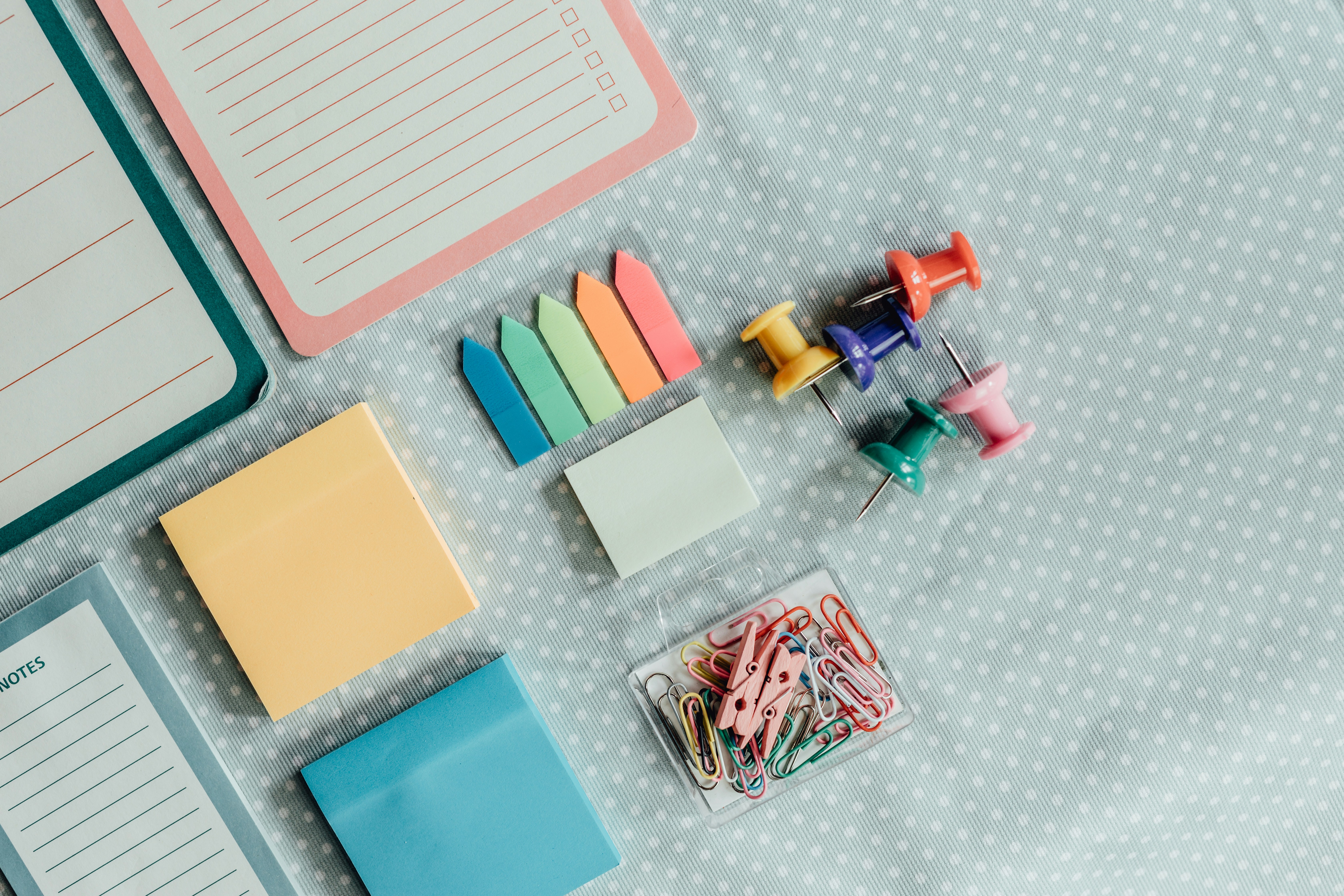 colorful note-taking supplies on a desk