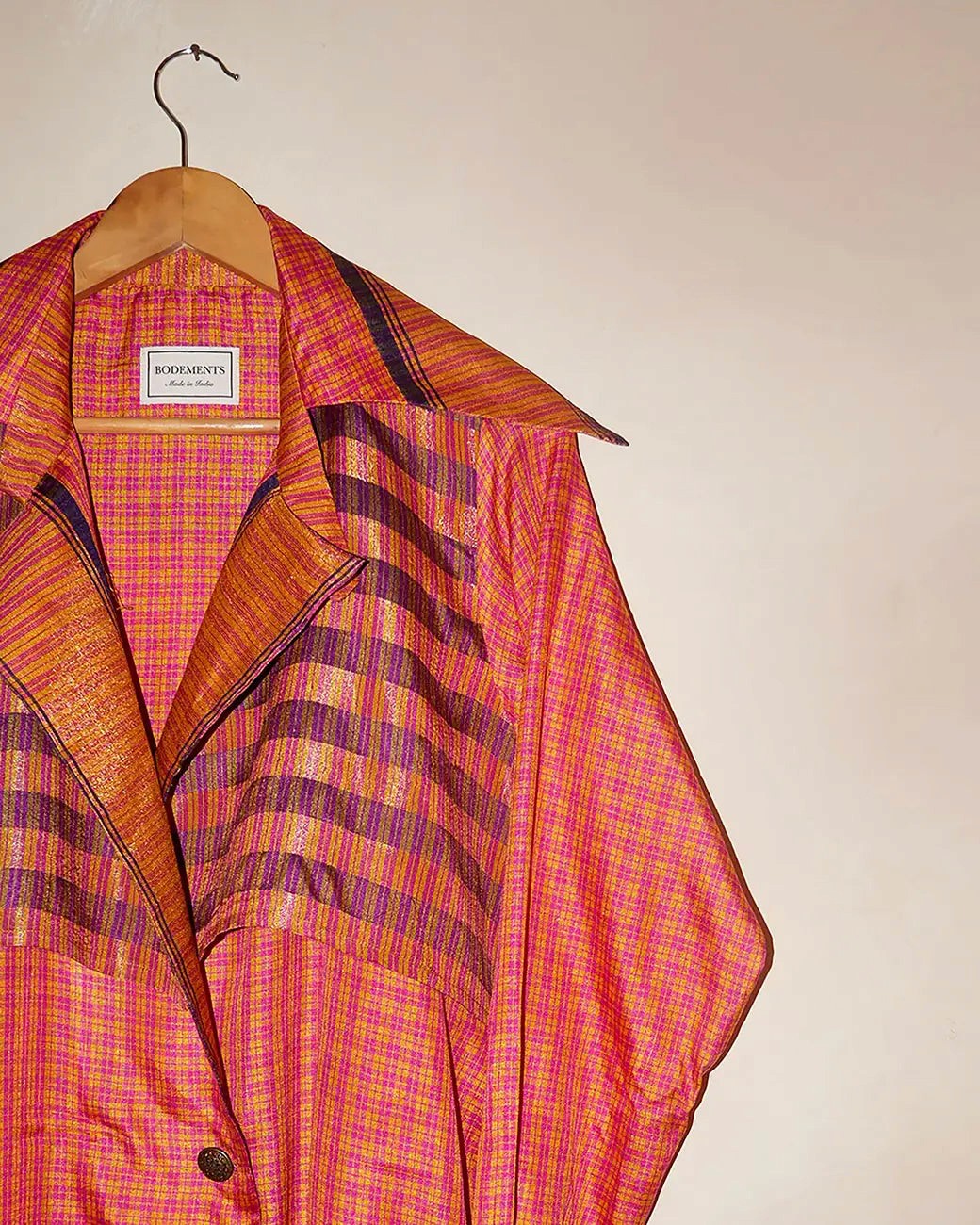 Lightweight, versatile, and full of character, this trench coat is a true celebration of heritage craft, conscious making, and enduring style—a statement layer that moves seamlessly from day to evening.