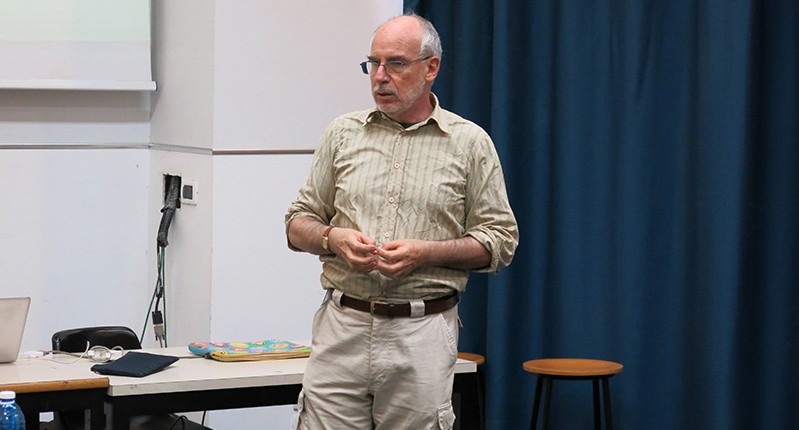 man teaching at school