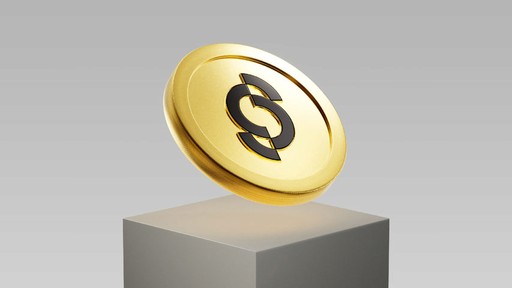a gold token sitting on top of a pedestal, in a brightly lit environment
