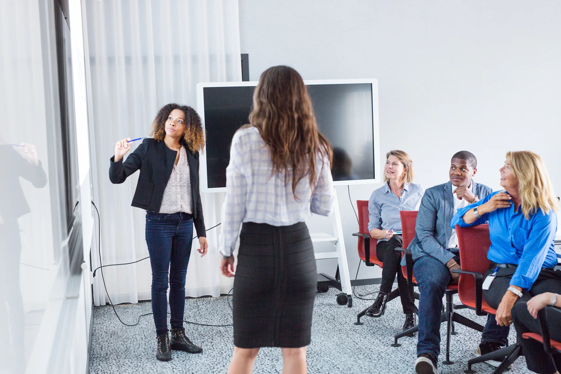 Business Presentation with Colleagues in the Office