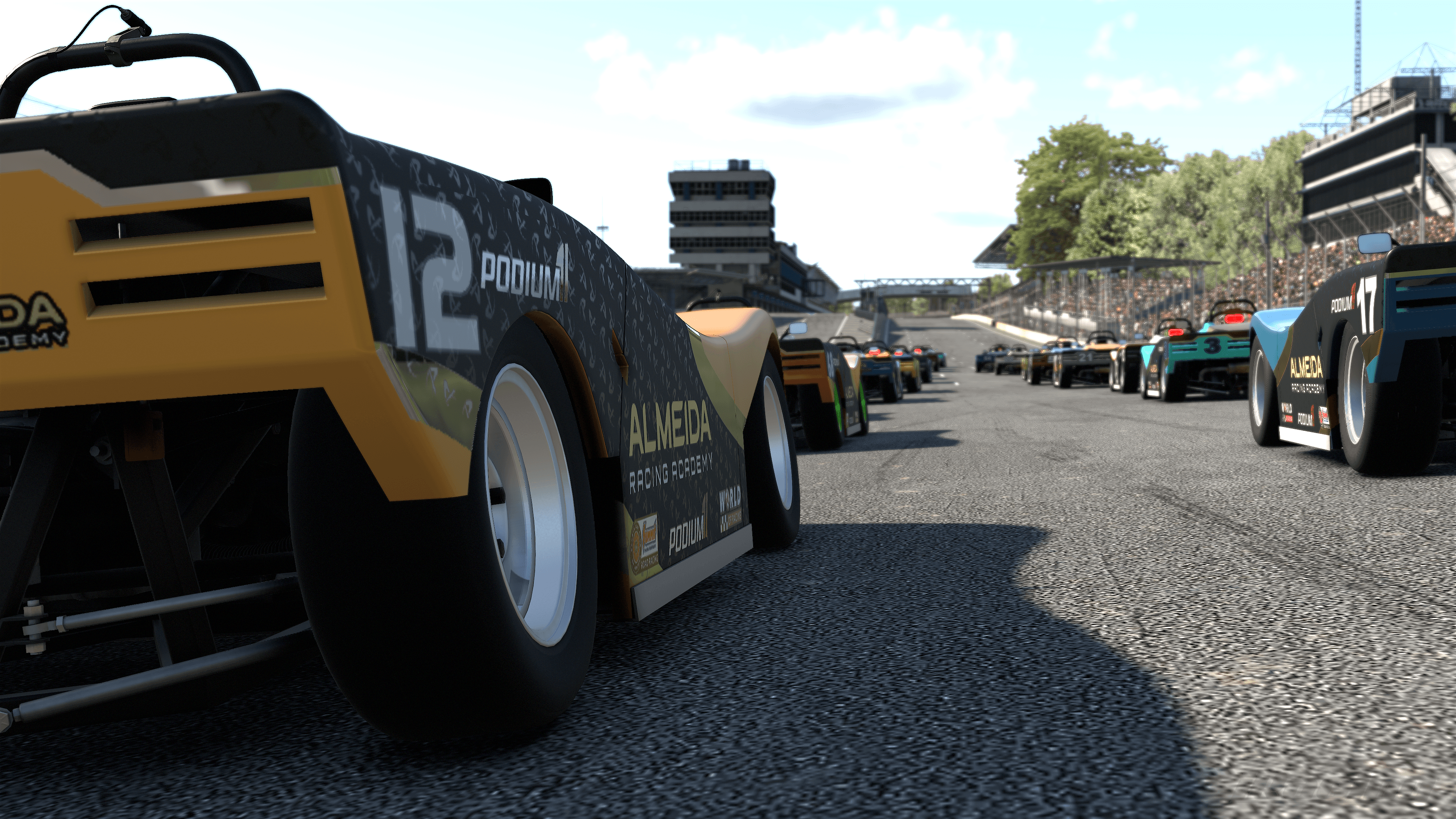 Sim racers driving together during a community event on track