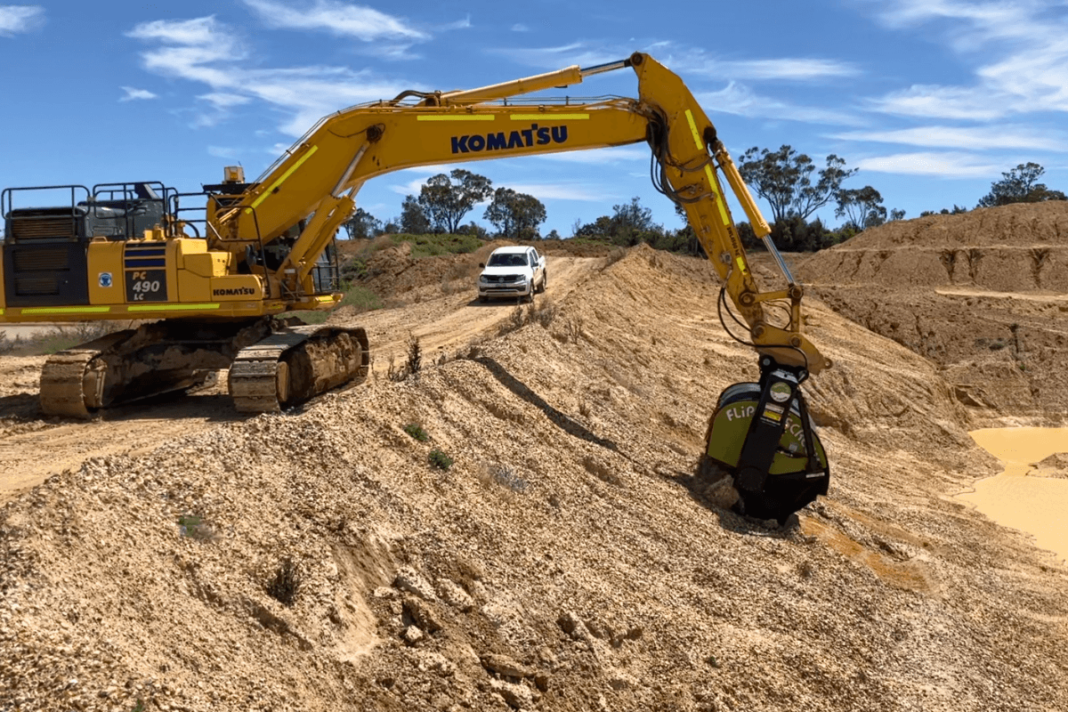 FlipScreen attachment on a Komatsu Excavator