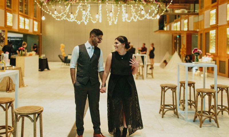 Newly Engaged couple celebrating at the State Library of Queensland