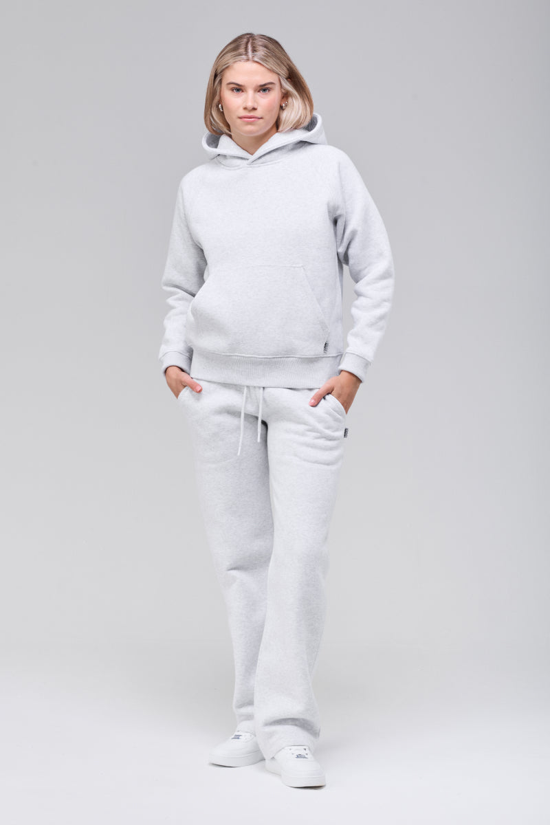 Sunday Superior Belmont Hoodie in heather grey colorway, front view, hands in pockets.