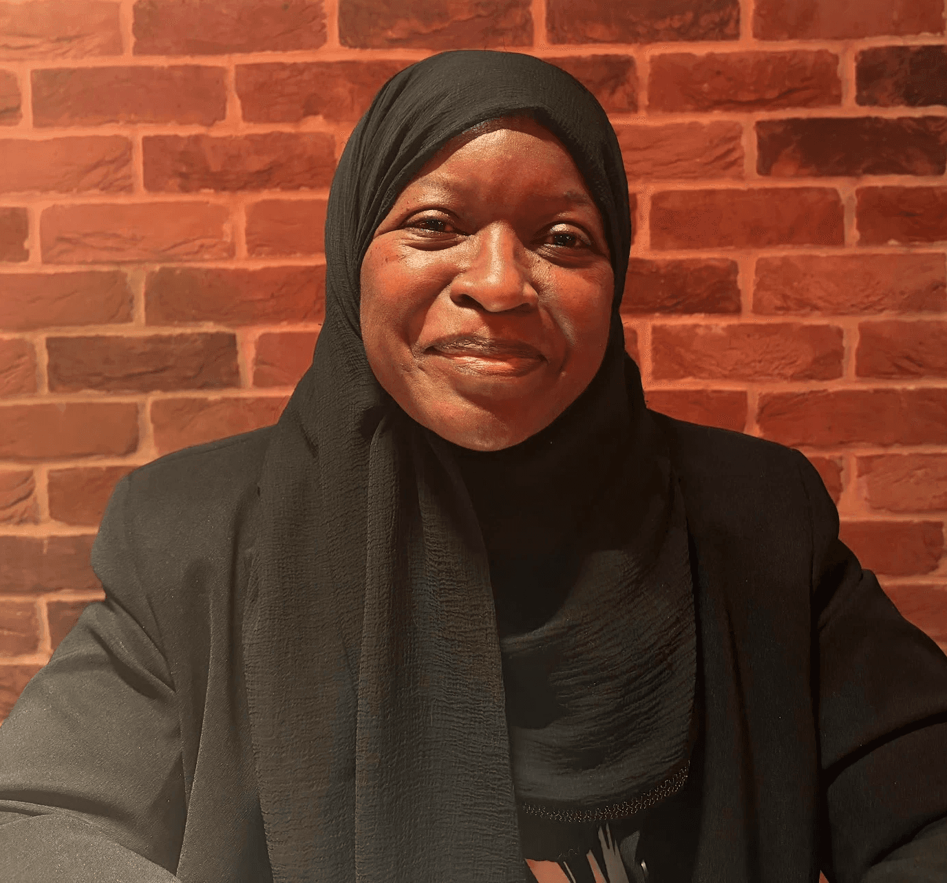 corporate woman folding arms