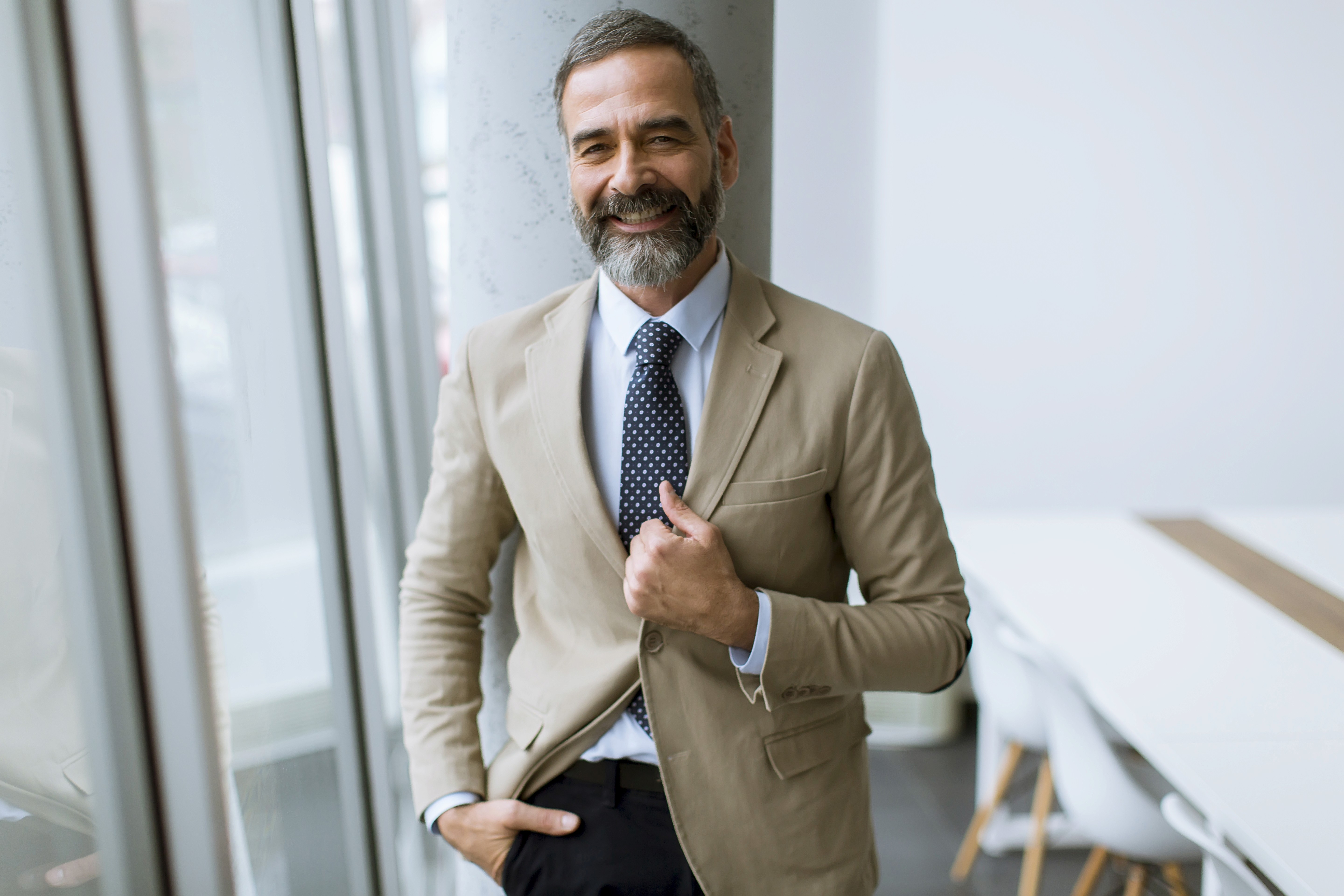 woman in red cardigan smiling