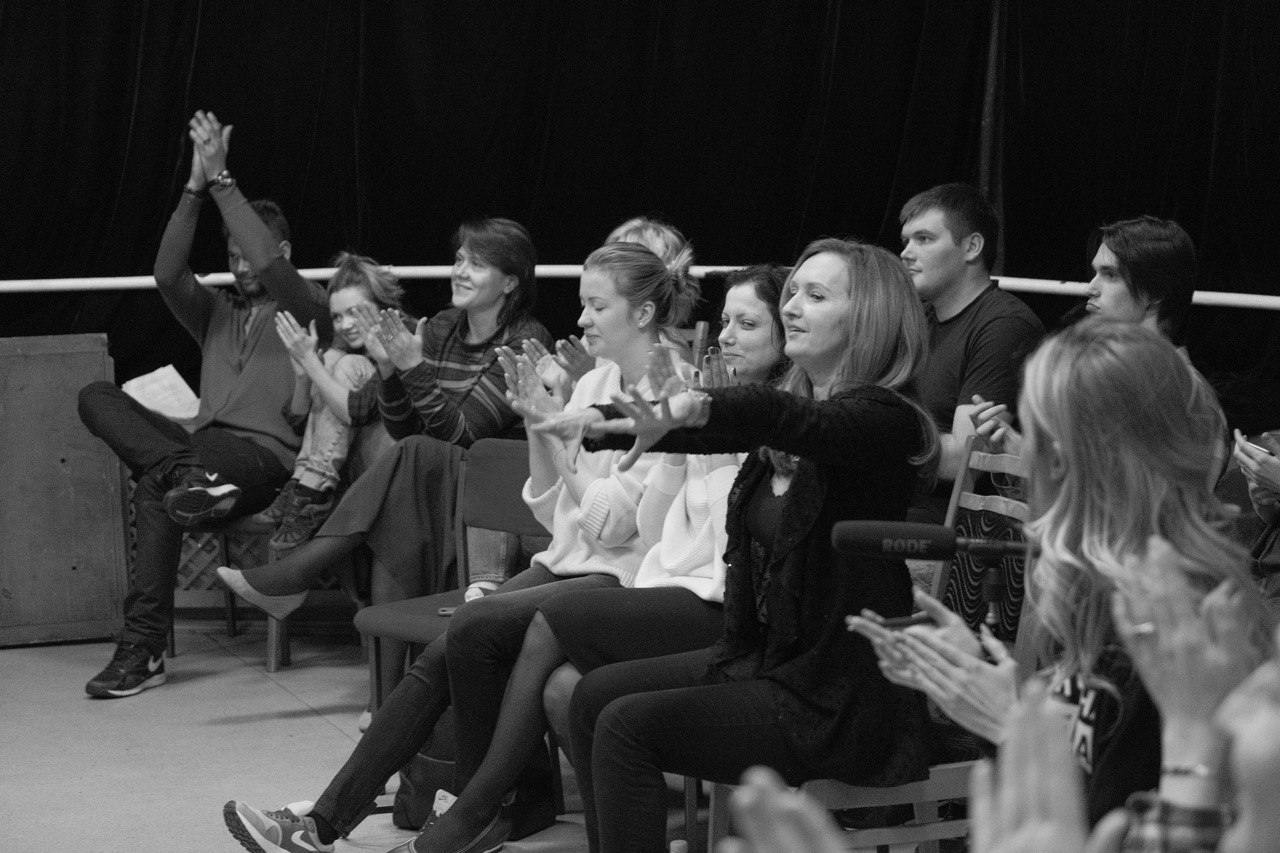 man sitting beside woman looking at a contract on DocuSign