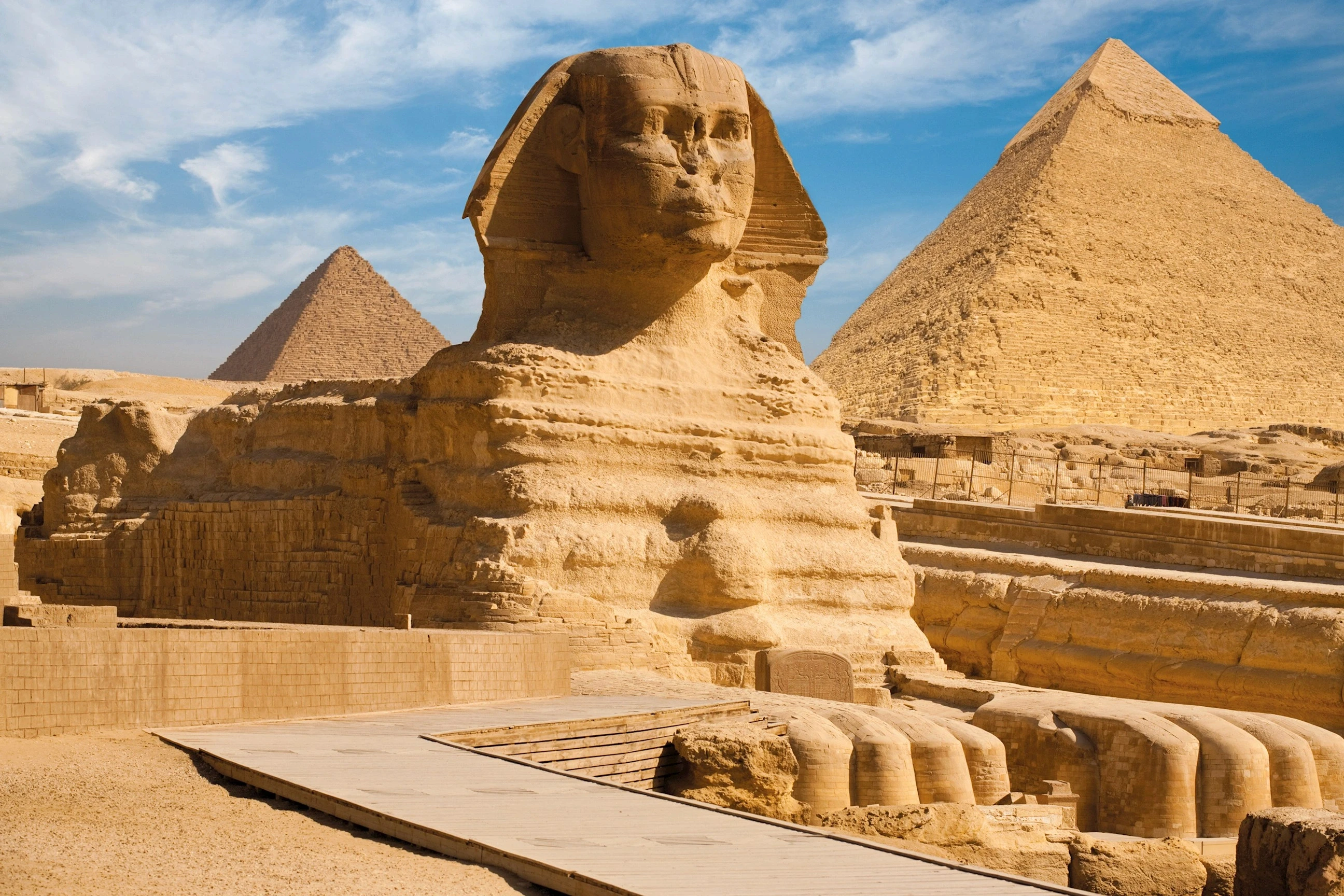 Great Sphinx with Giza Pyramids backdrop