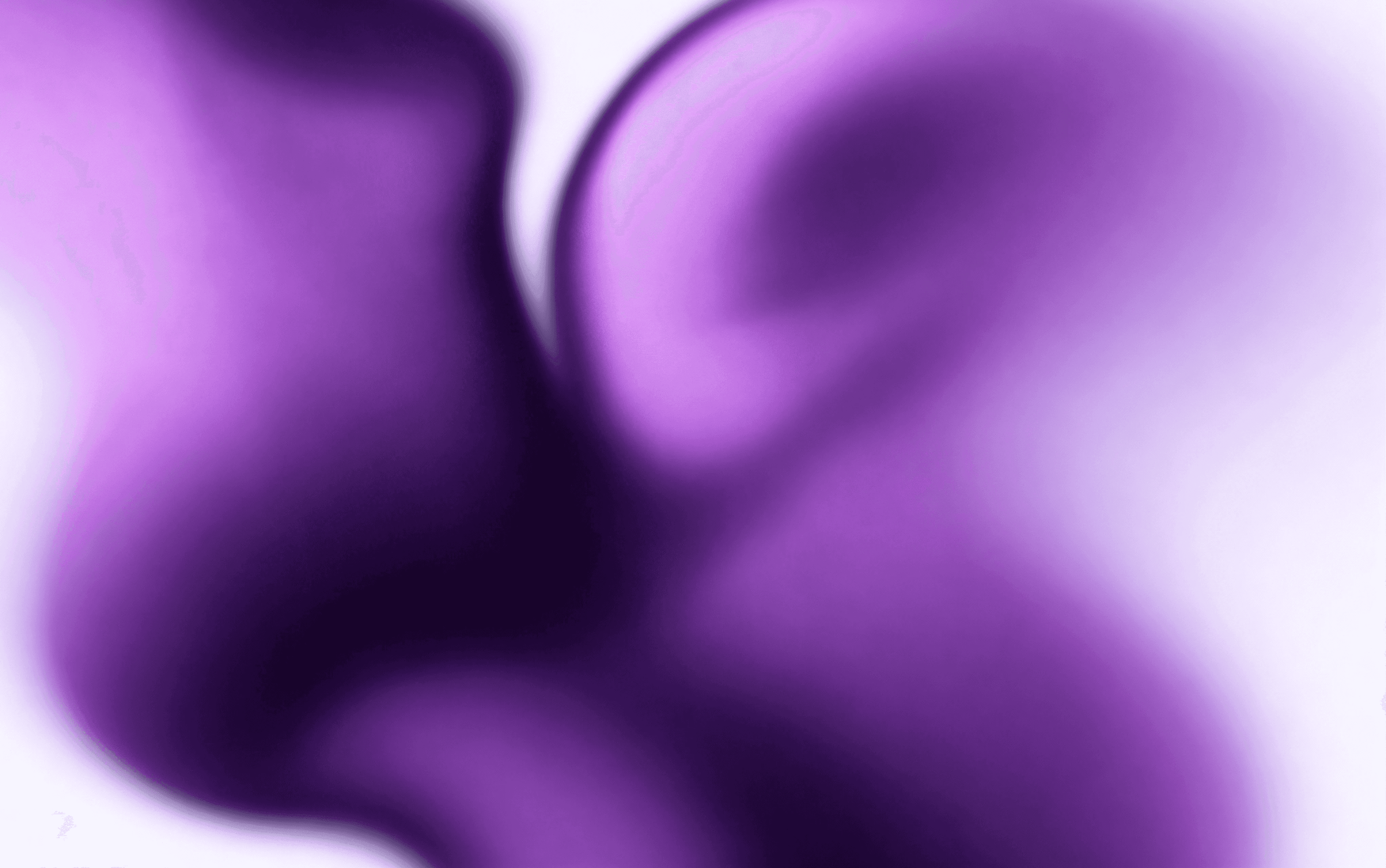 a blurry image of a purple and blue background