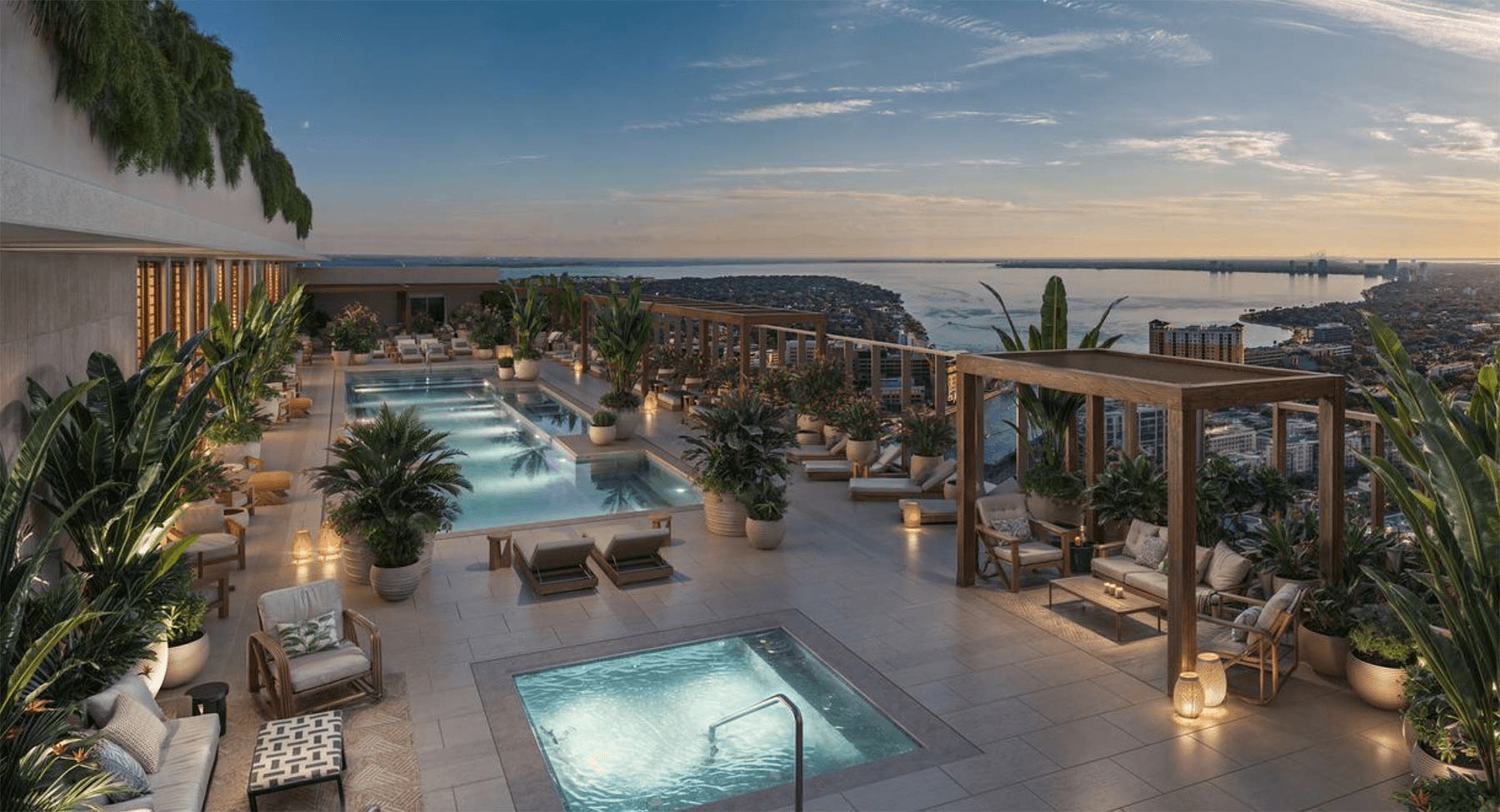 Rooftop pool deck and lounge area at Pendry Residences Tampa with panoramic views of downtown Tampa skyline