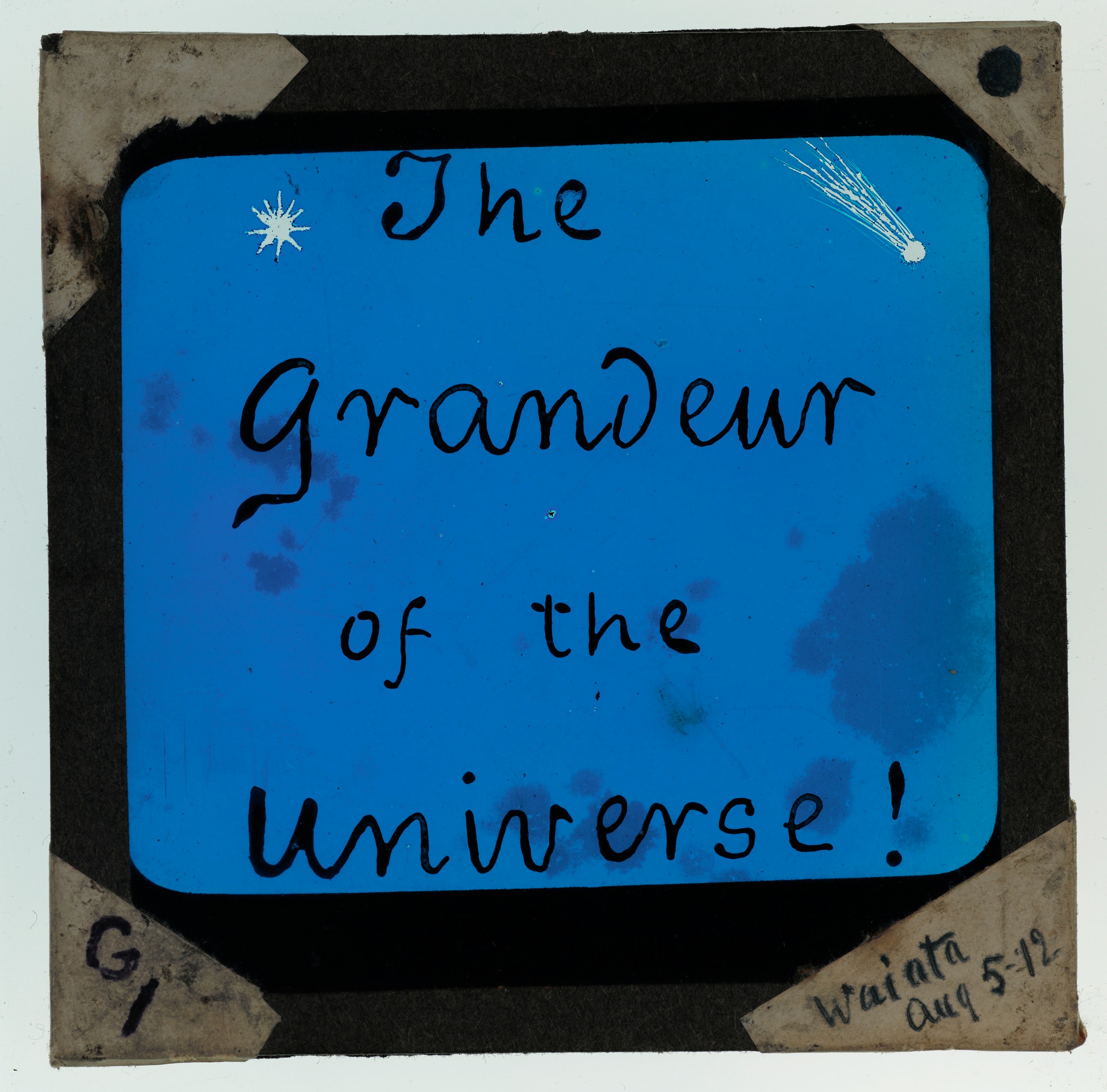 The grandeur of the universe text on blue background