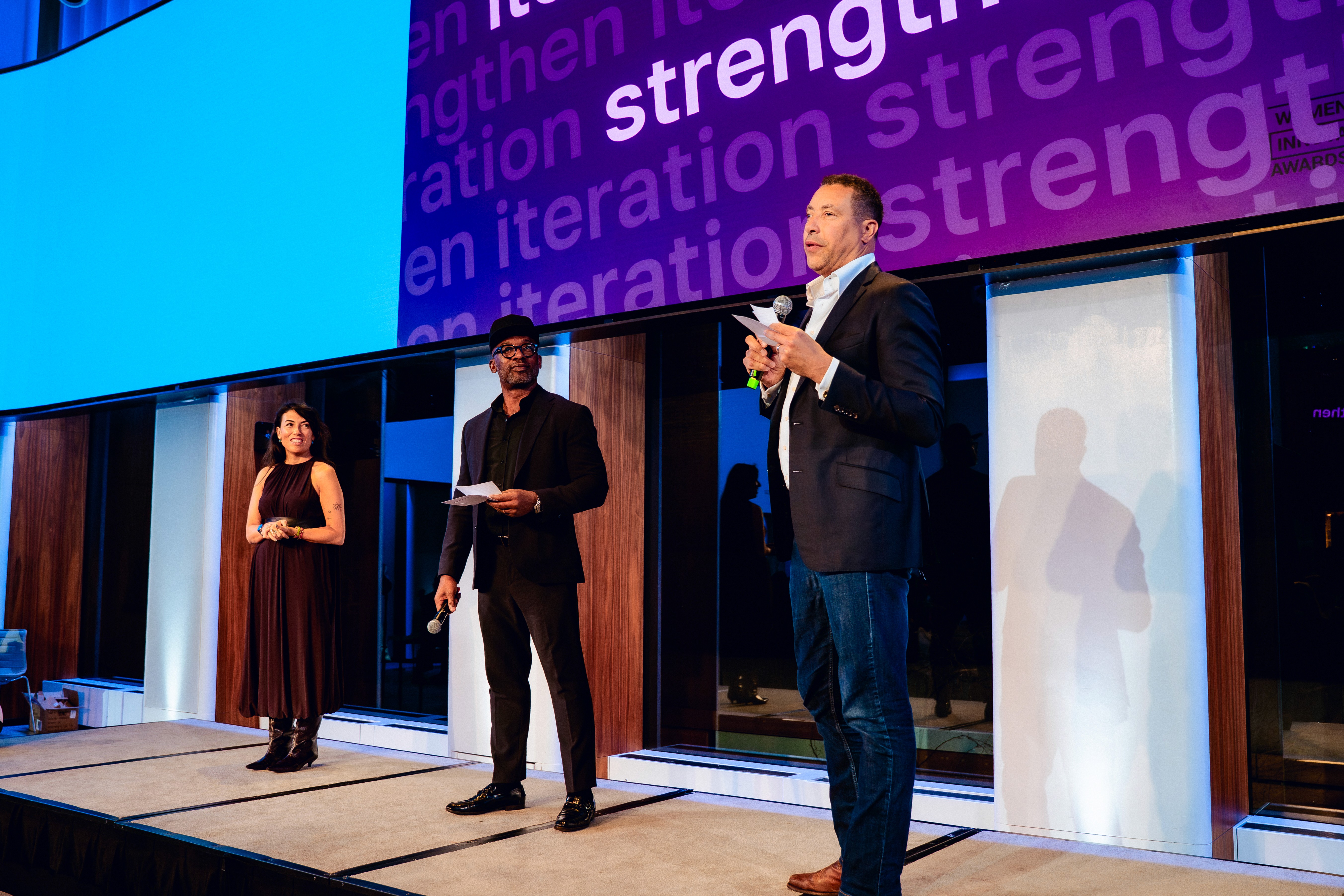 Crowd of people chatting at the WIN Awards 2025