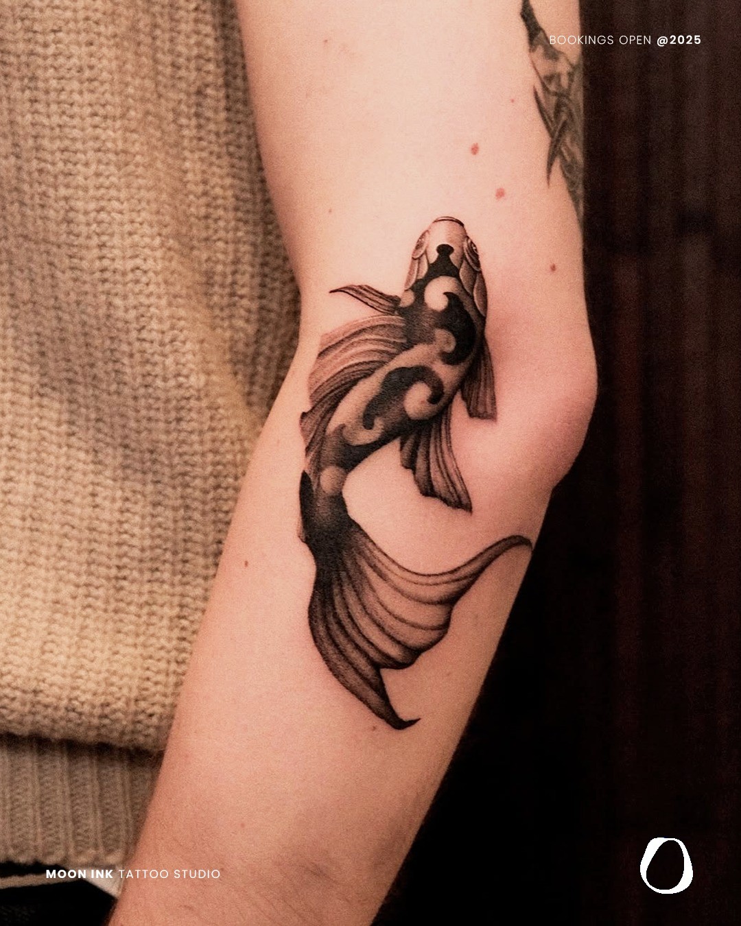 a laptop computer sitting on top of a white chair