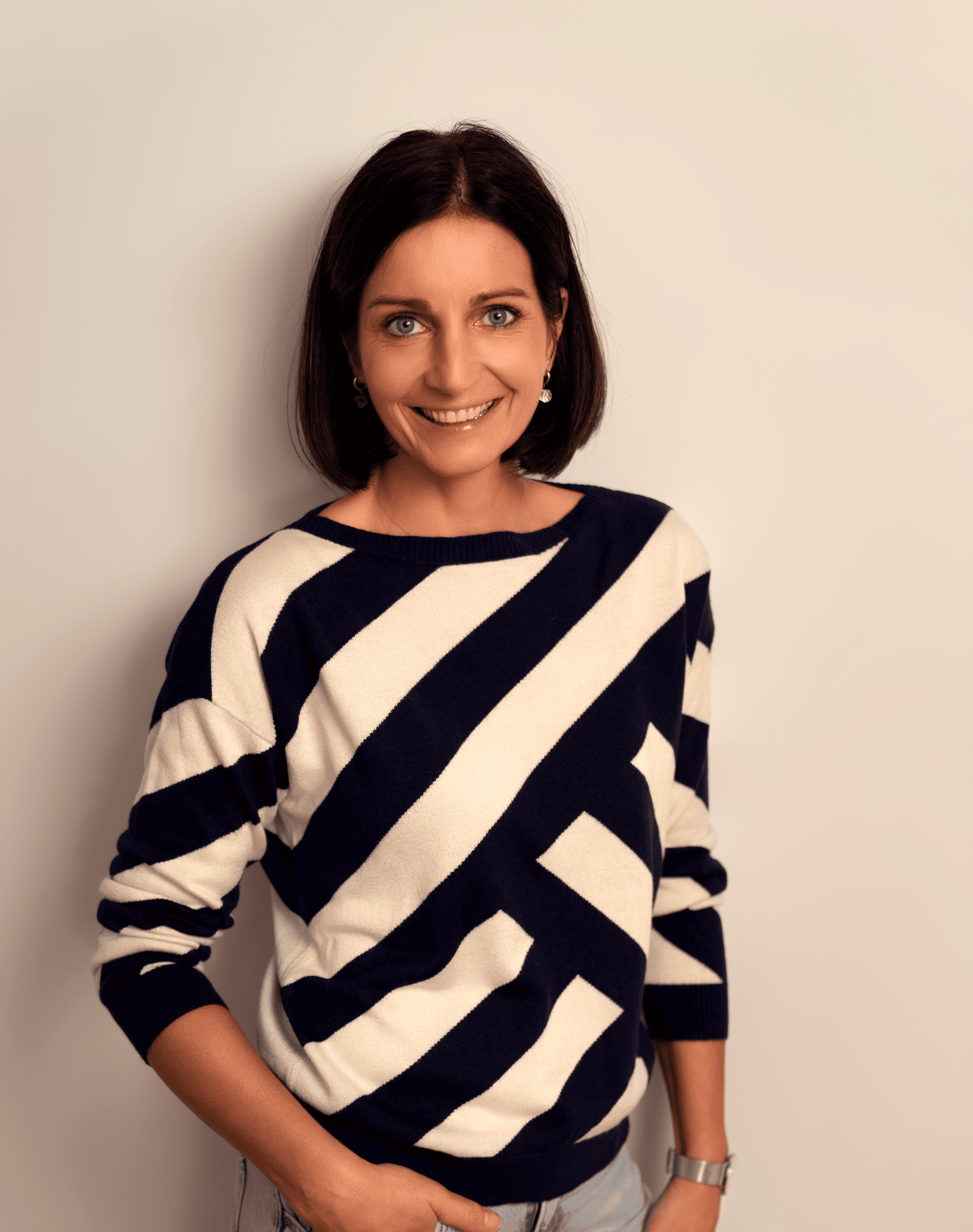 A doctor is reviewing documents with two clients.