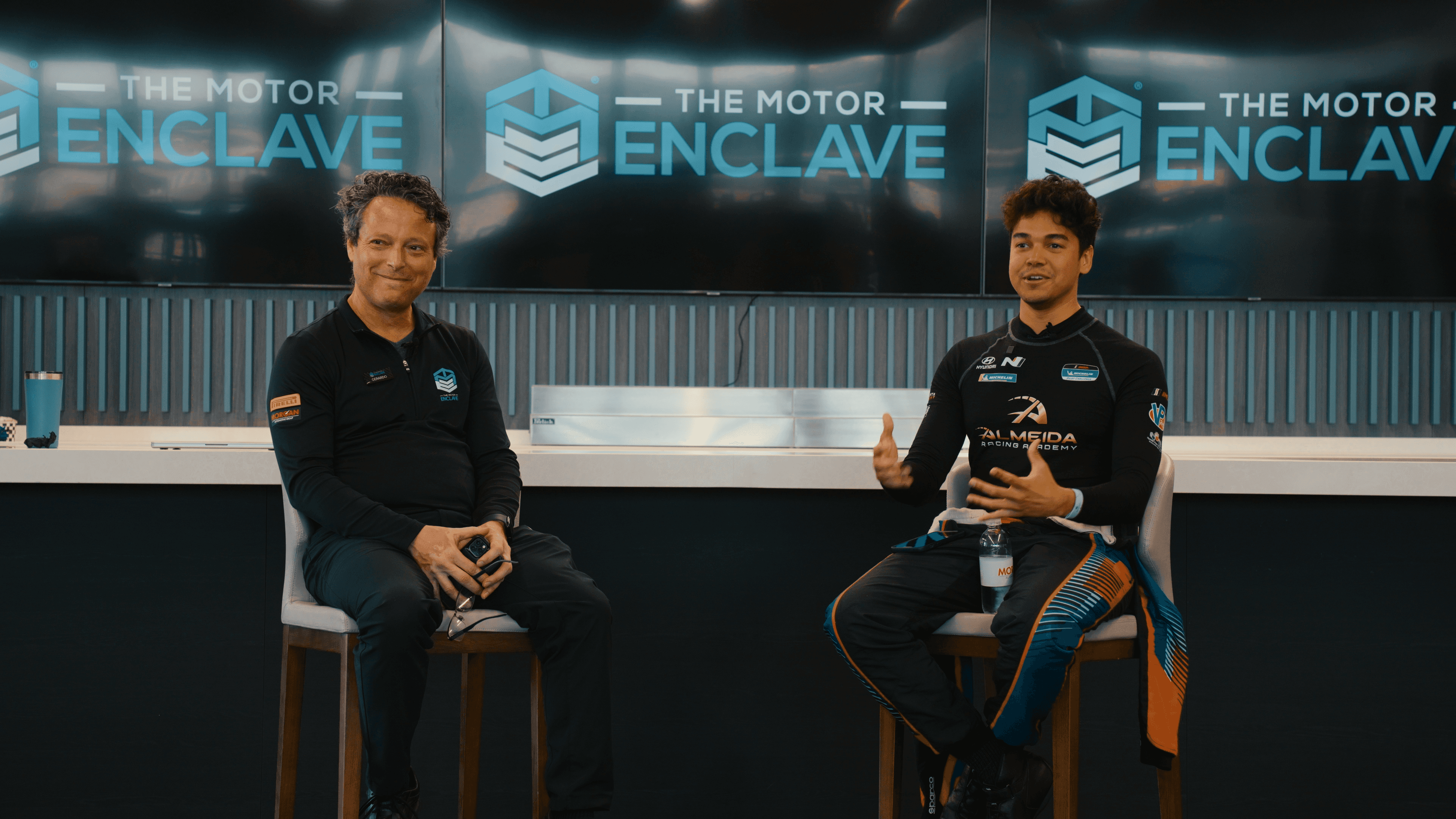 Suellio Almeida. IMSA Driver, North America Radical Racecar Champion, Founder of Almeida Racing Academy. Sitting with Enclave Presentor