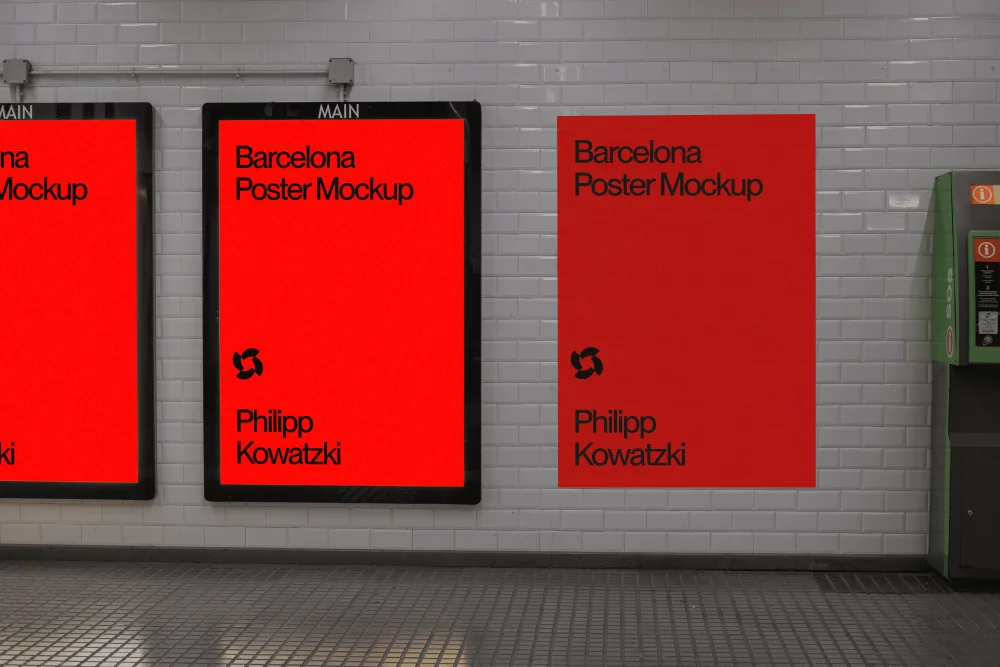 Subway station poster mockup featuring vibrant red posters with black frames against a white tiled wall. The scene includes a green emergency call box and patterned gray flooring for an urban aesthetic.
