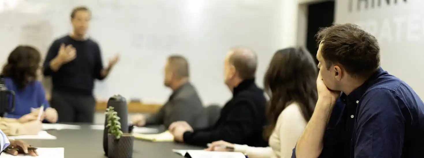 Table of people in meeting