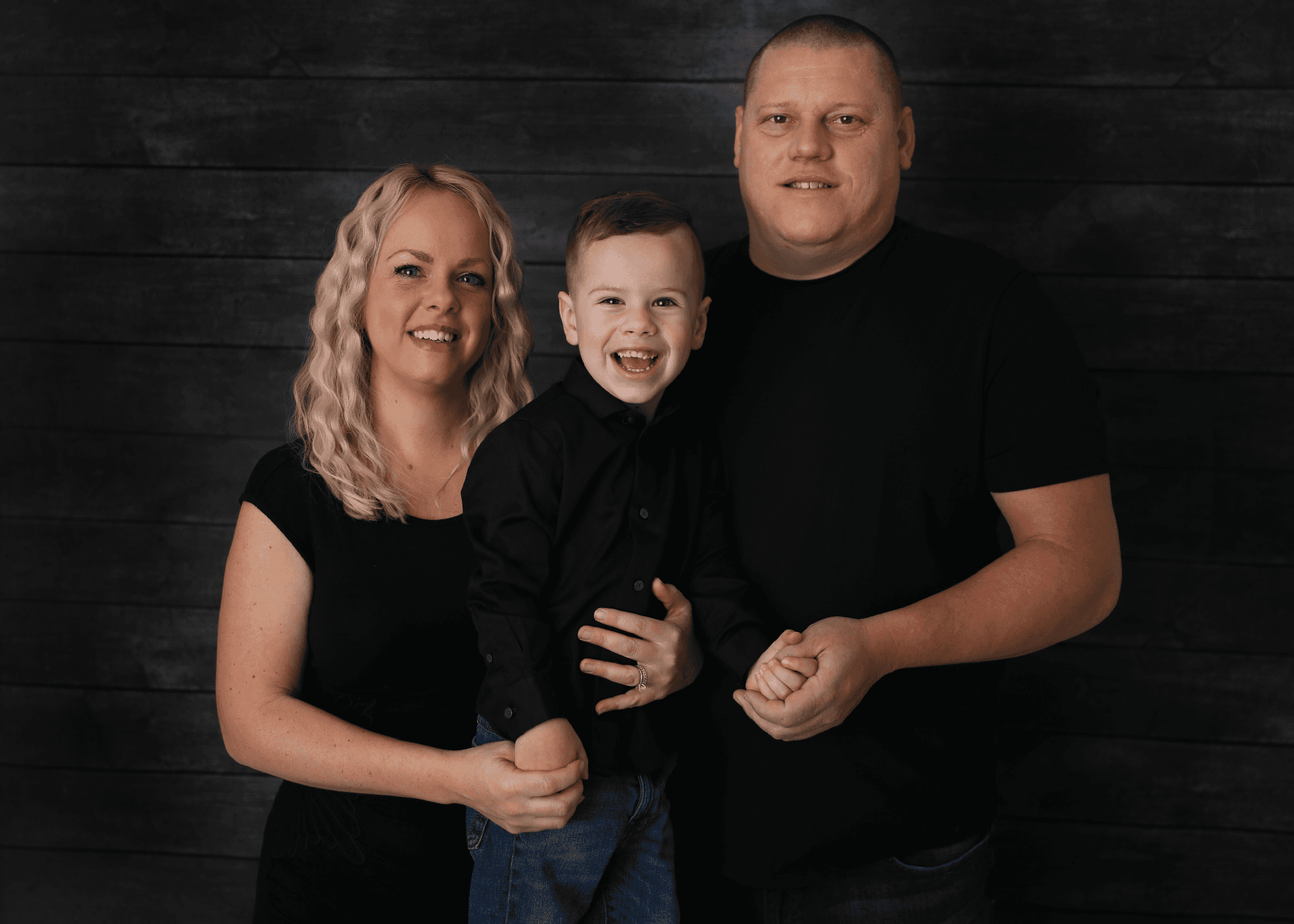 Summers family portrait featuring Randee, Chris, and their son.