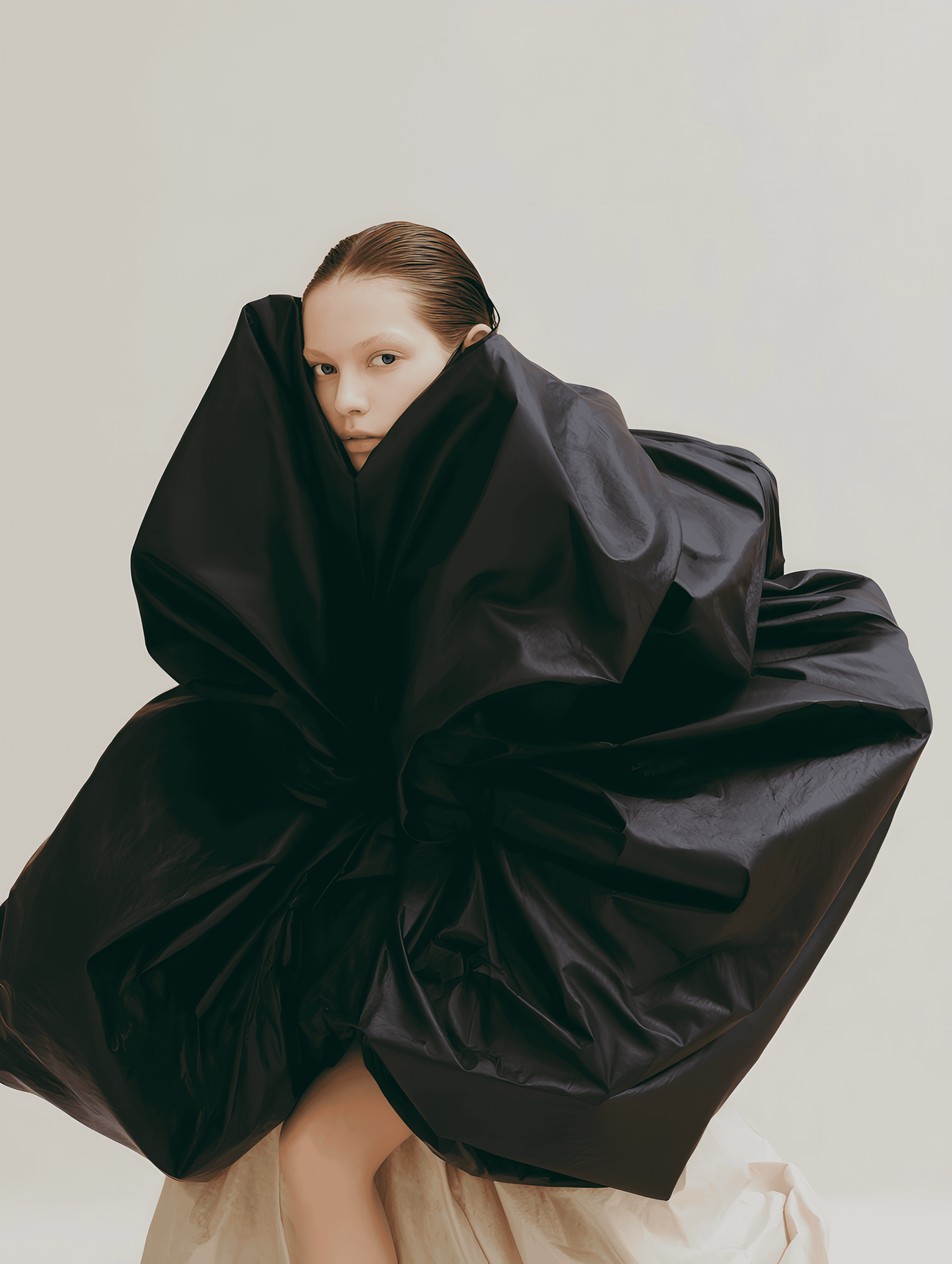 Close-up of a vintage blue car's rear emblem.