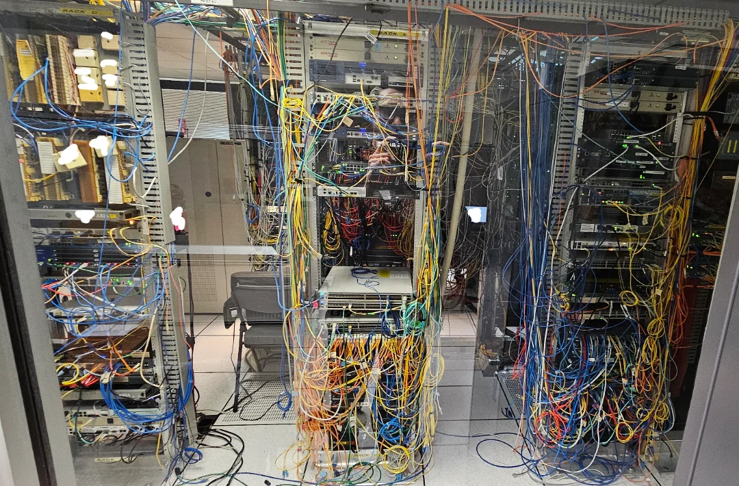 Complex sprawling server infrastructure representing ungoverned AI agent proliferation across an enterprise