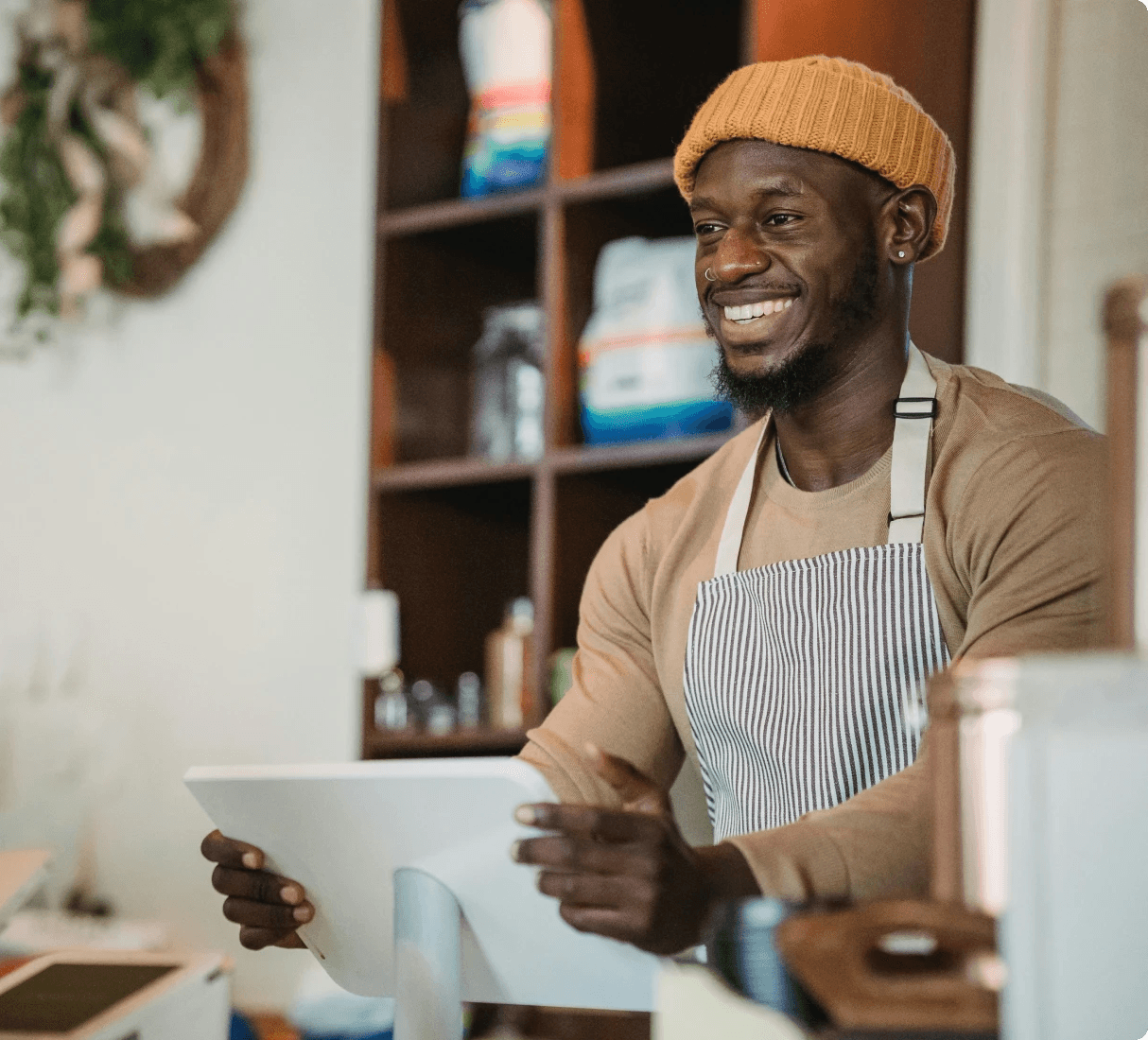 happy business owner with loyalty platform