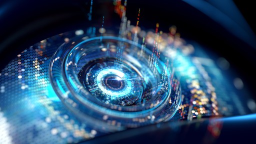 woman in black shirt sitting beside black flat screen computer monitor
