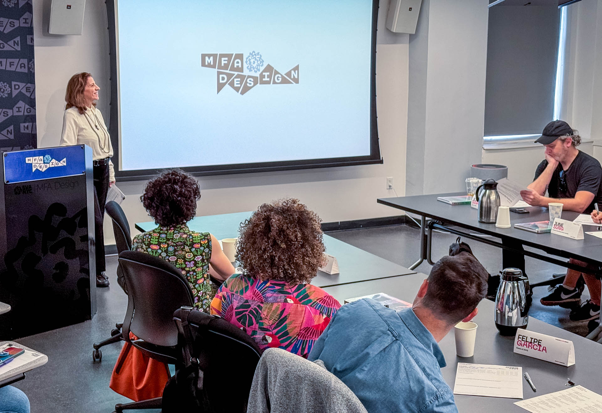 Lita addressing the class