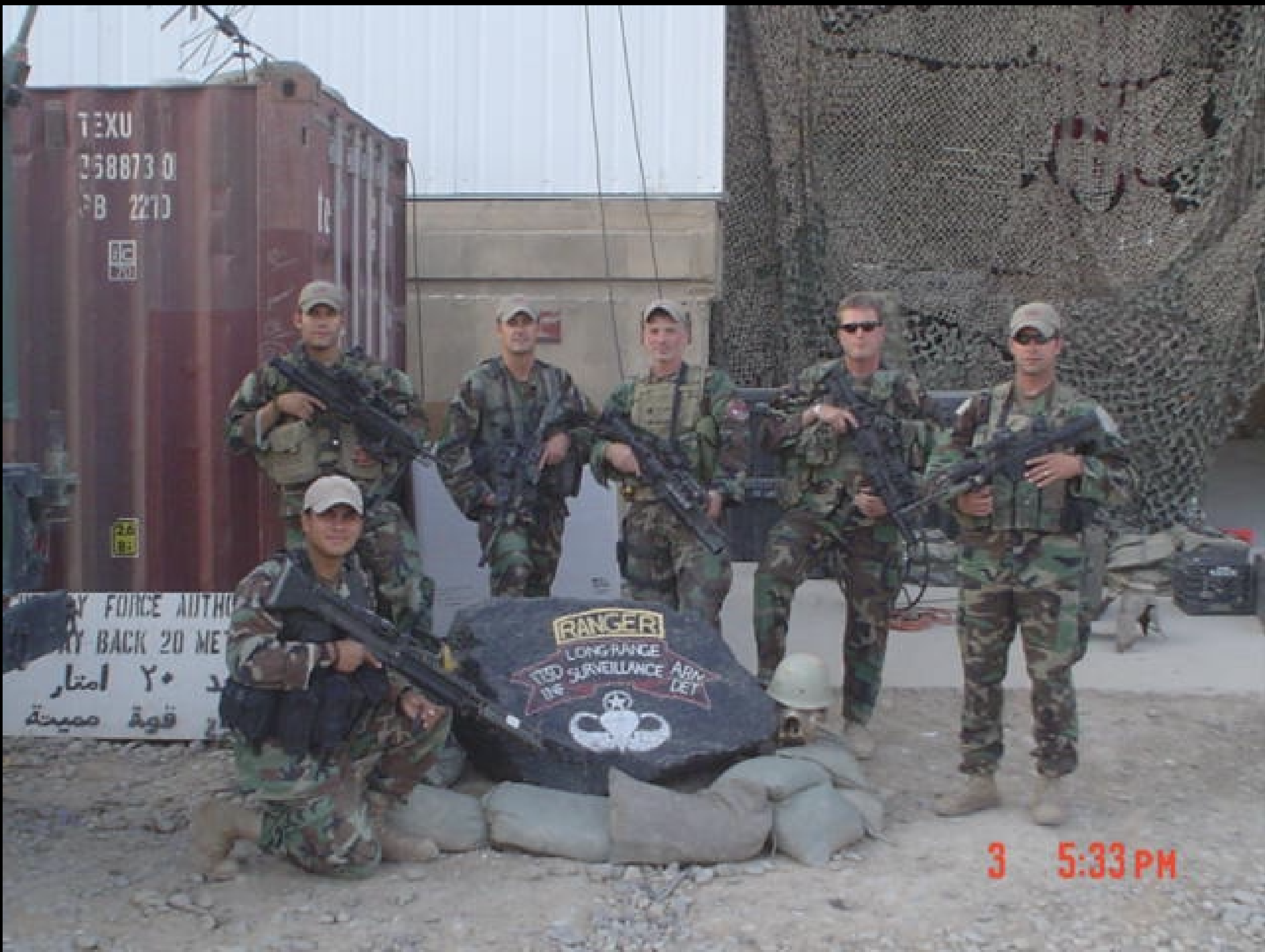 Robert Carrigg (center) with fellow U.S. Army Rangers during overseas deployment — the foundation of discipline and precision that Bob Carrigg brought to founding Carrigg Commercial Builders in 2001