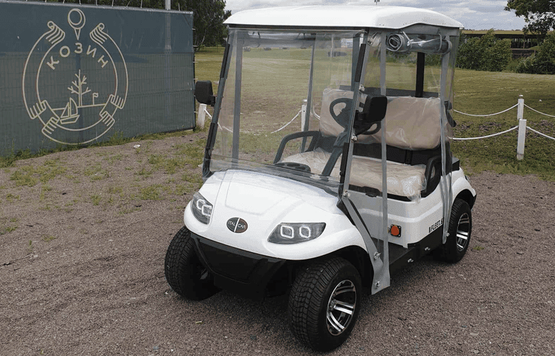 a golf cart with a golf bag