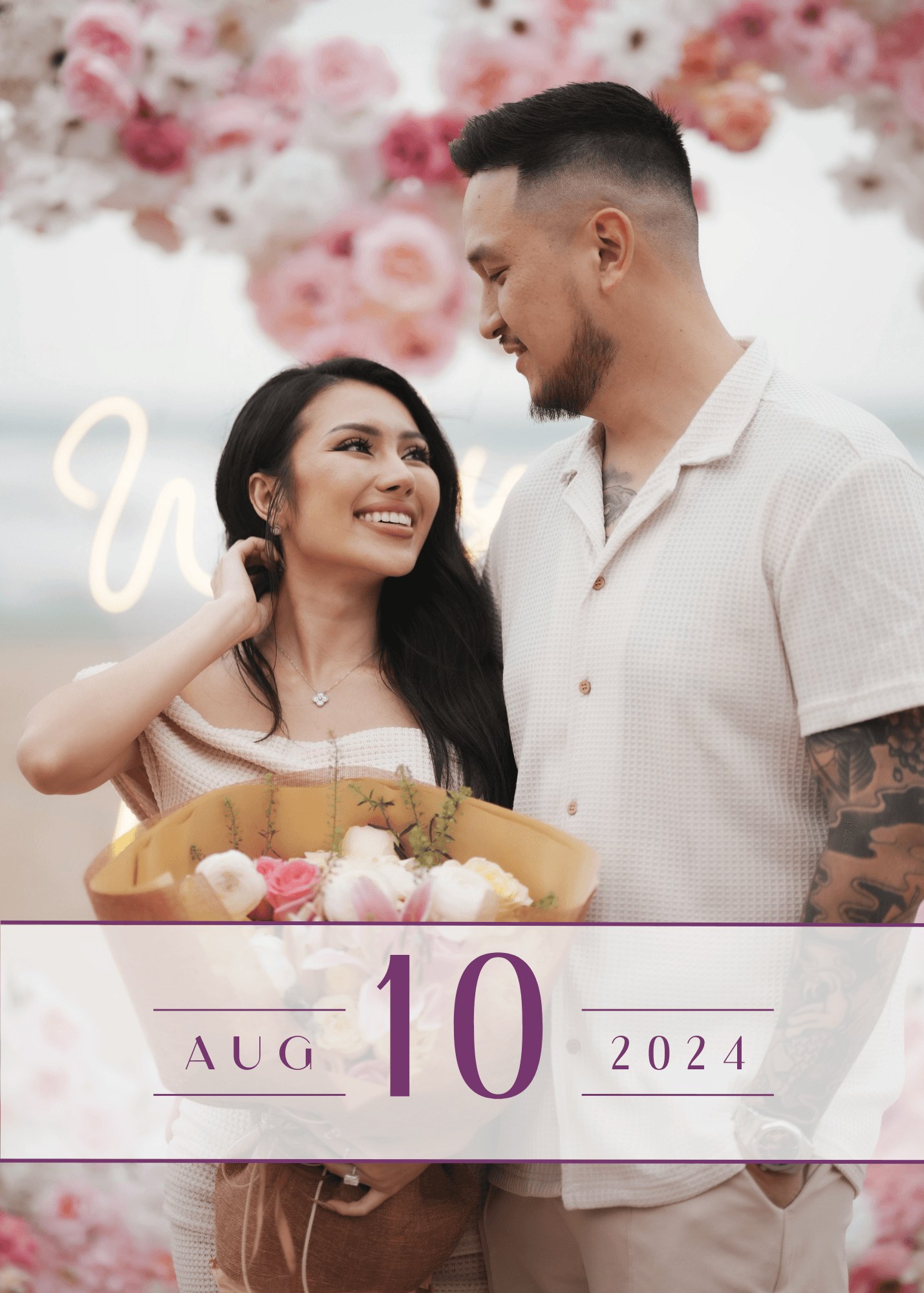 A person with curly hair sits at a desk, working on a laptop in a cozy, well-lit environment.