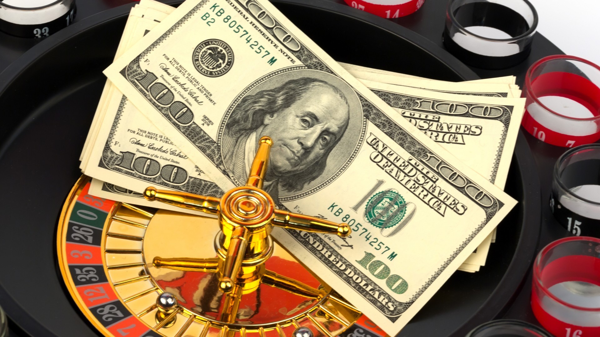 Money on a roulette wheel representing financial risk and potential money laundering in gambling environments.