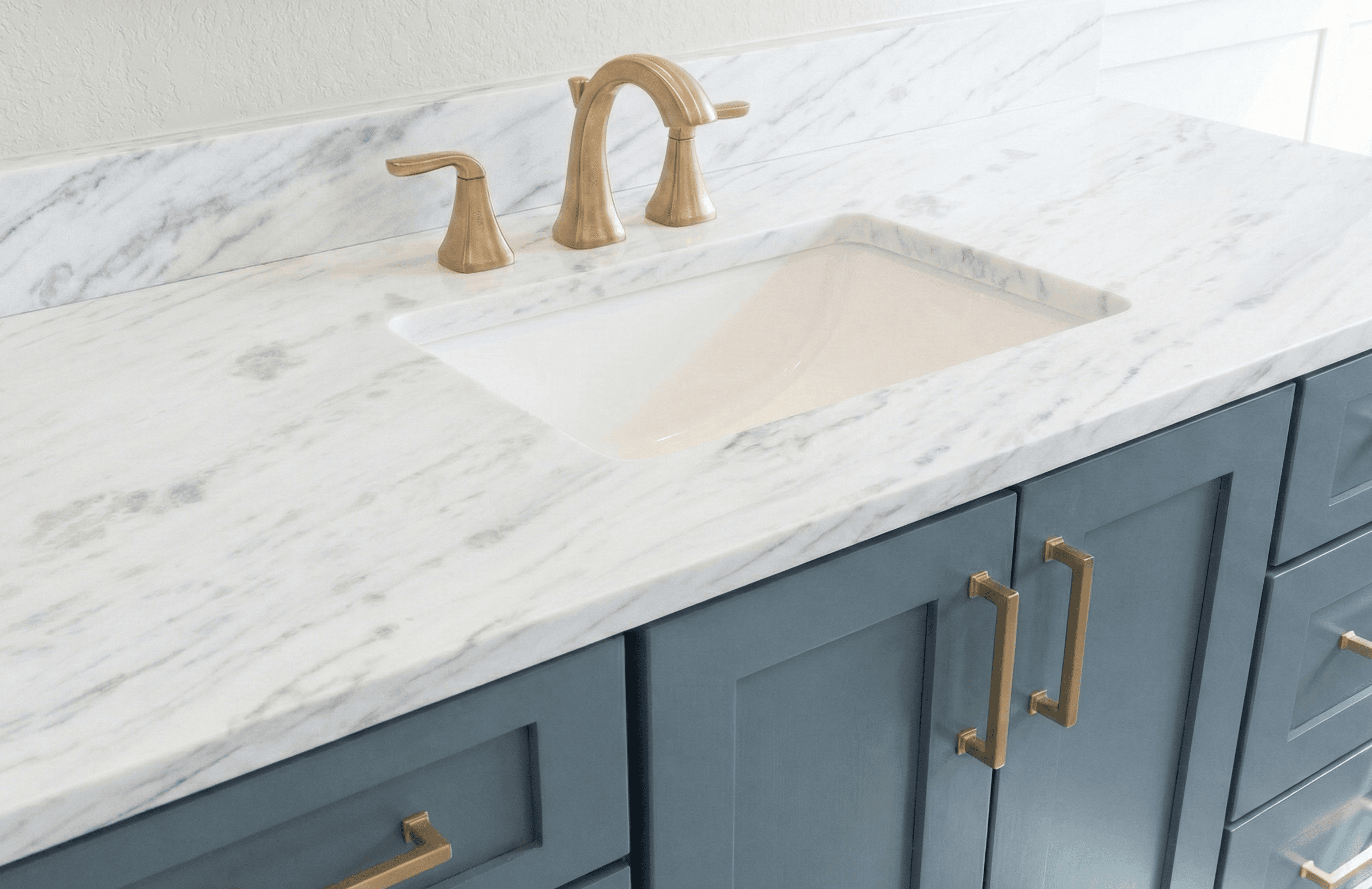 Bianca tesoro dolomite marble bathroom countertop installation by usa granite gold faucet hardware in dallas fort worth