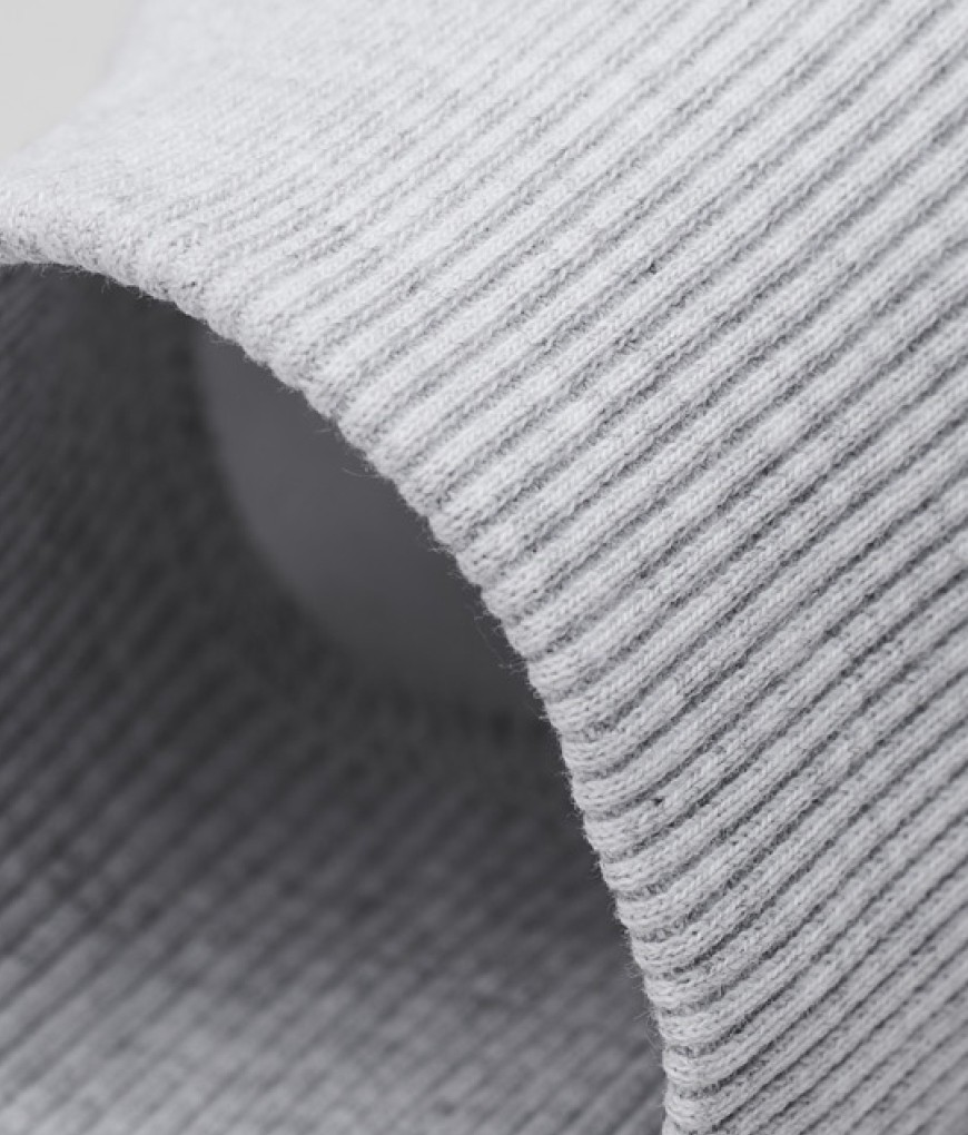 Close-up of Sunday Superior ribbed cuff on light grey hoodie