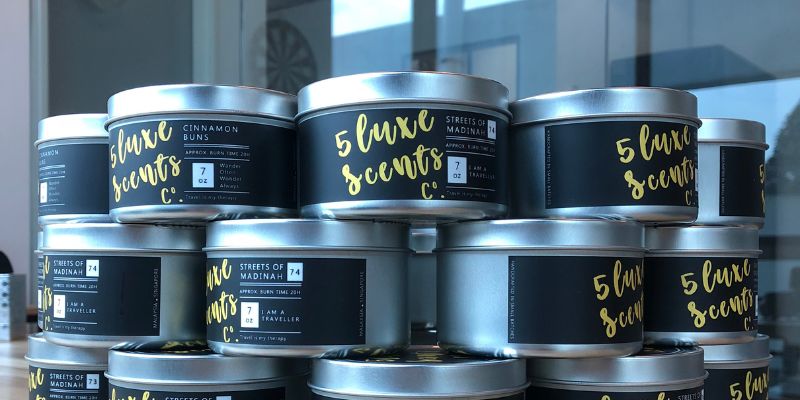 A tower of candles from 5Luxe Scents Co.