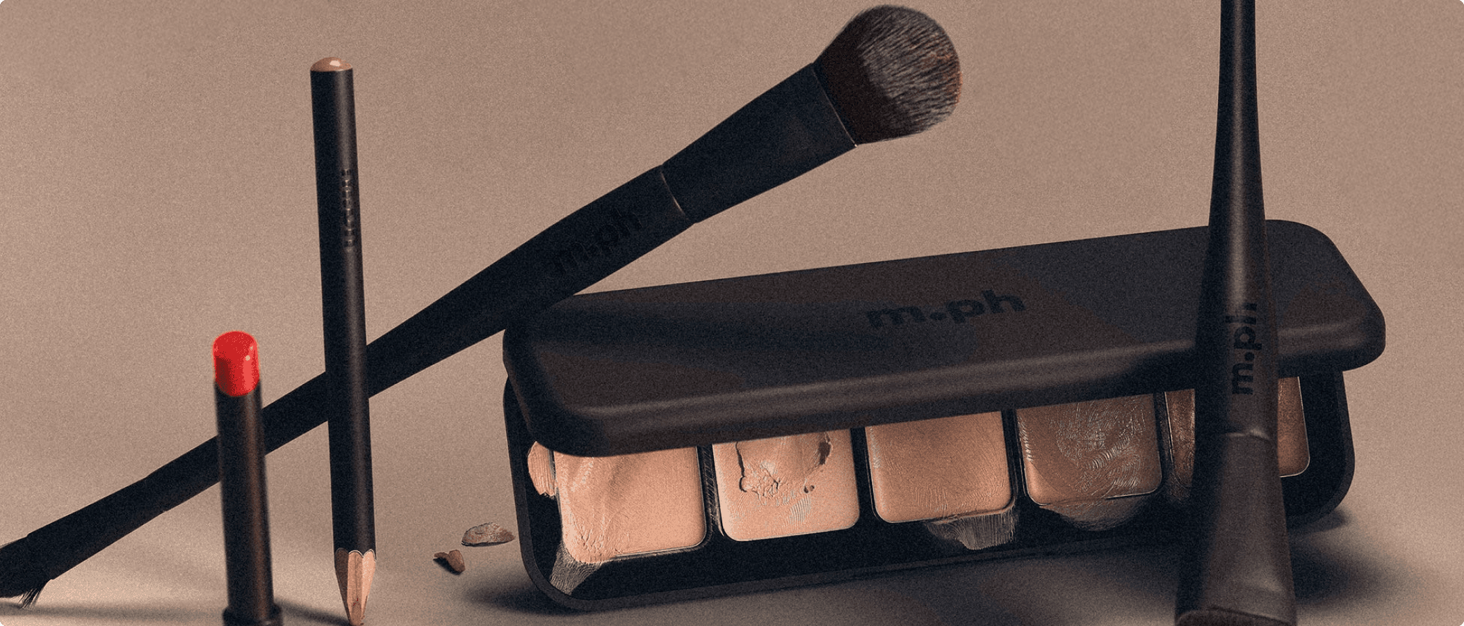 m.ph beauty makeup product lineup featuring foundation and applicator tools